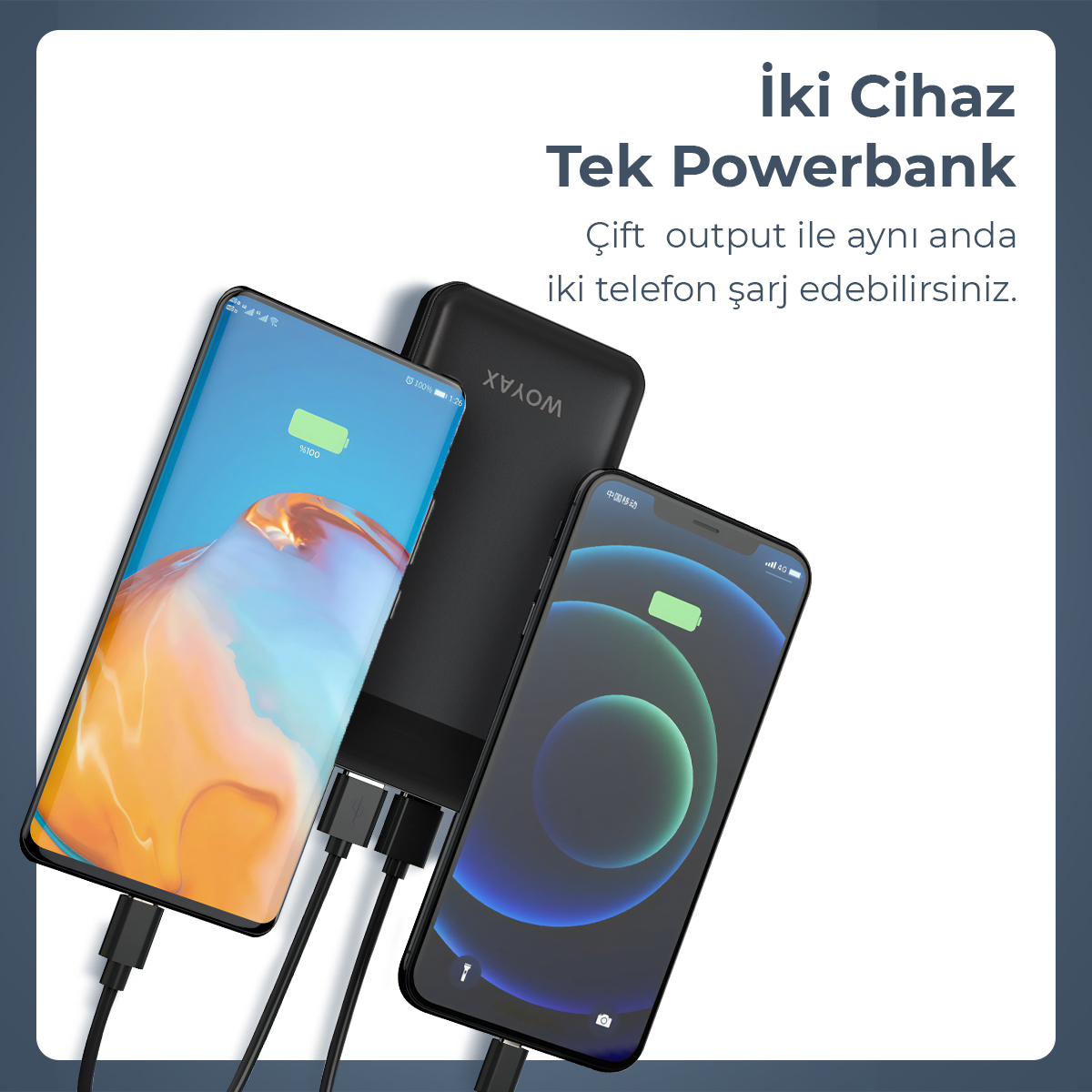 Siyah powerbank iki akıllı telefonu aynı anda şarj ediyor.