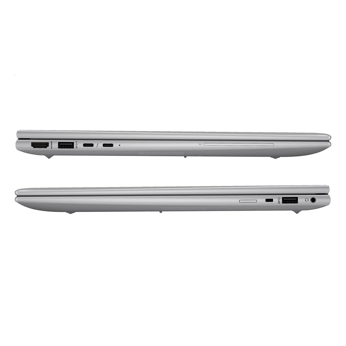 Dwa srebrne laptopy obok siebie, pokazujące porty.