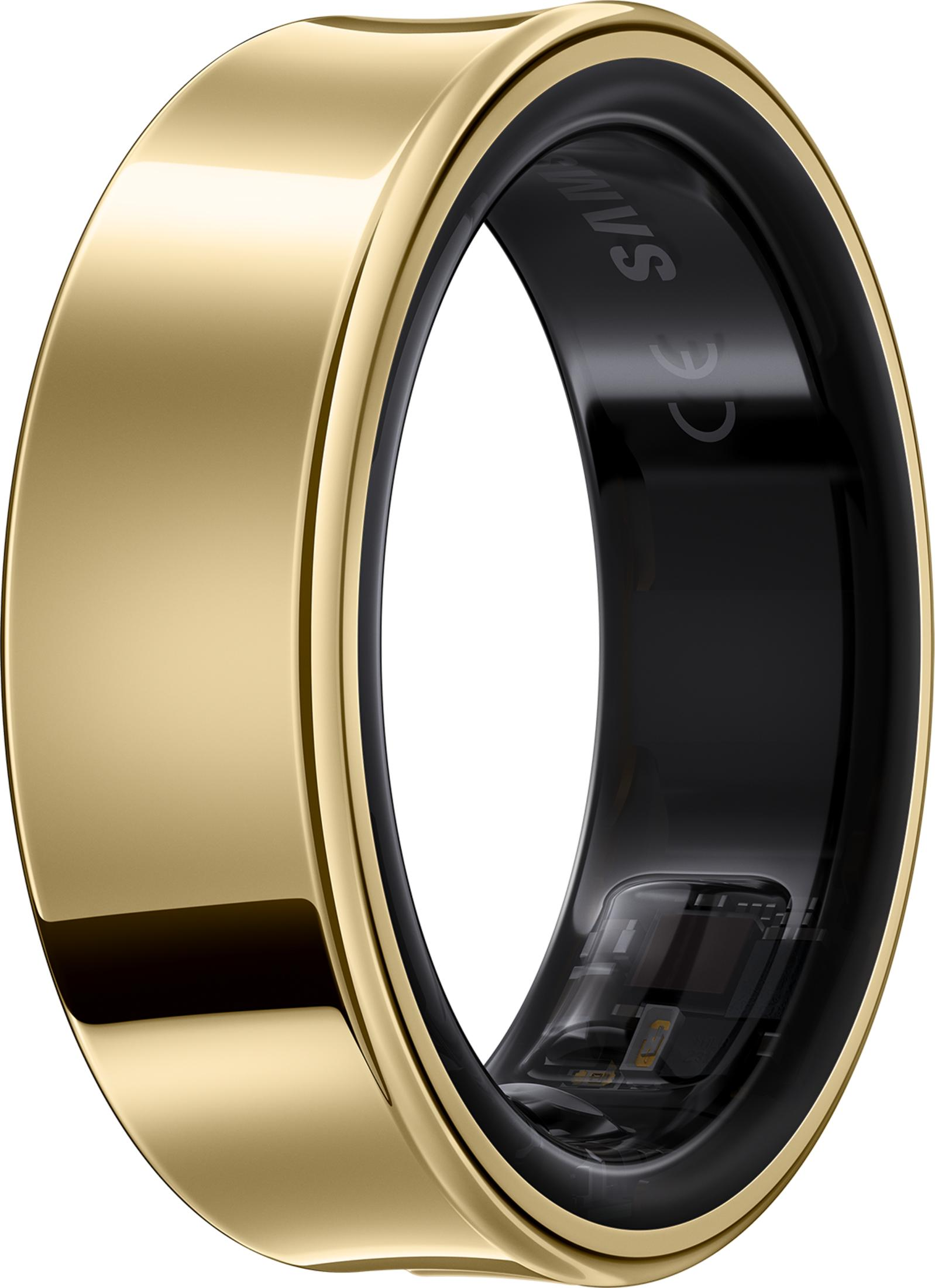 Goldener Ring mit schwarzem Einsatz, der interne Elektronik zeigt.