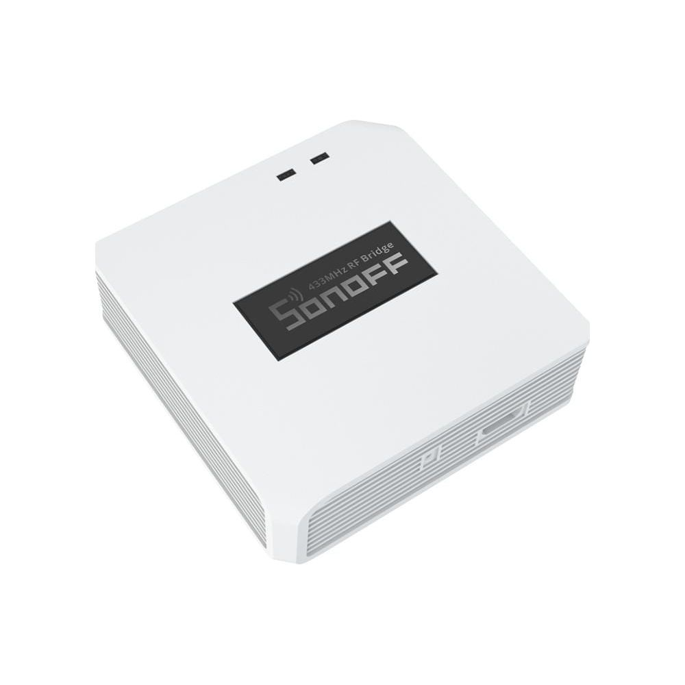 Białe urządzenie Sonoff 433MHz RF Bridge na białym tle.