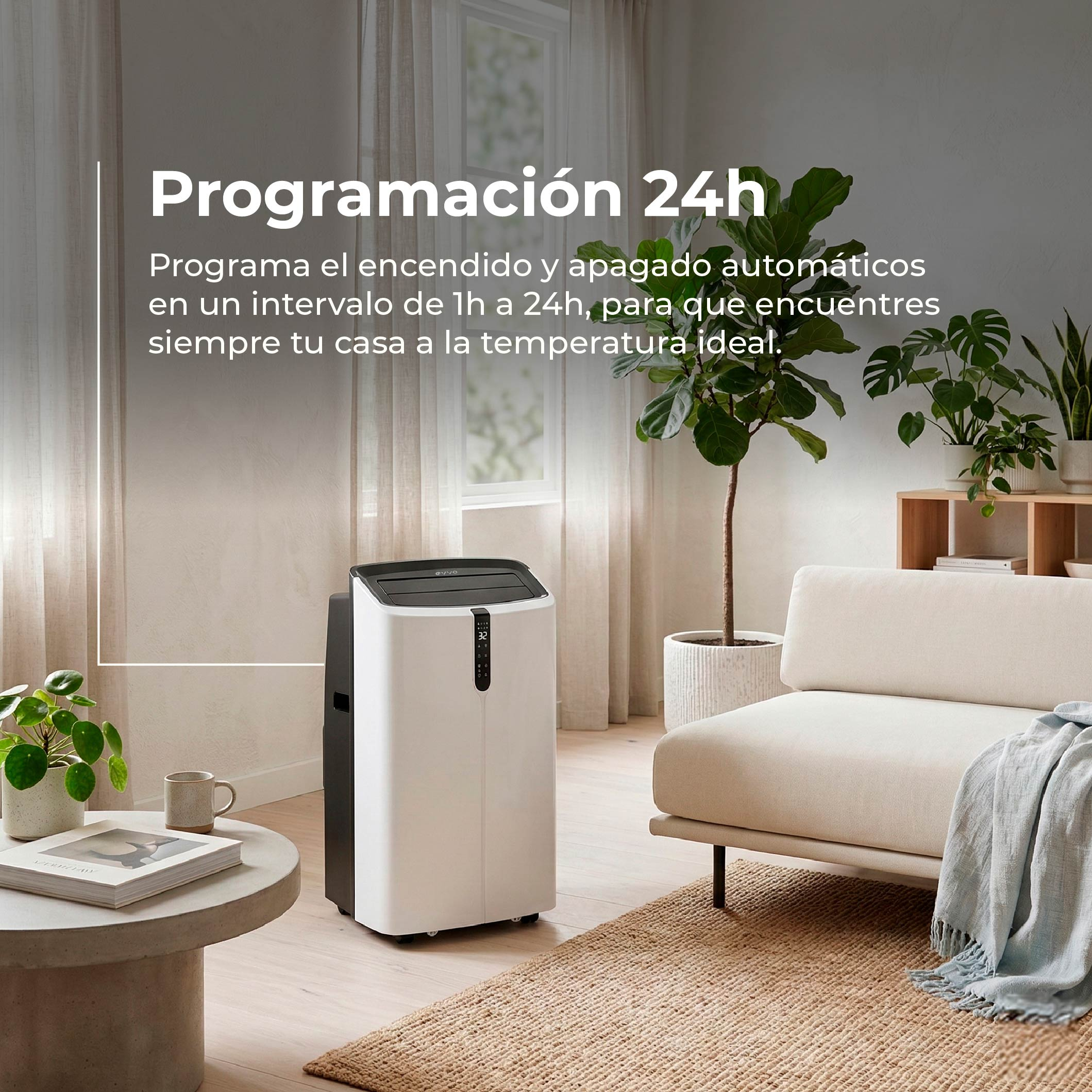 Un aire acondicionado portátil blanco junto a un sofá con plantas.