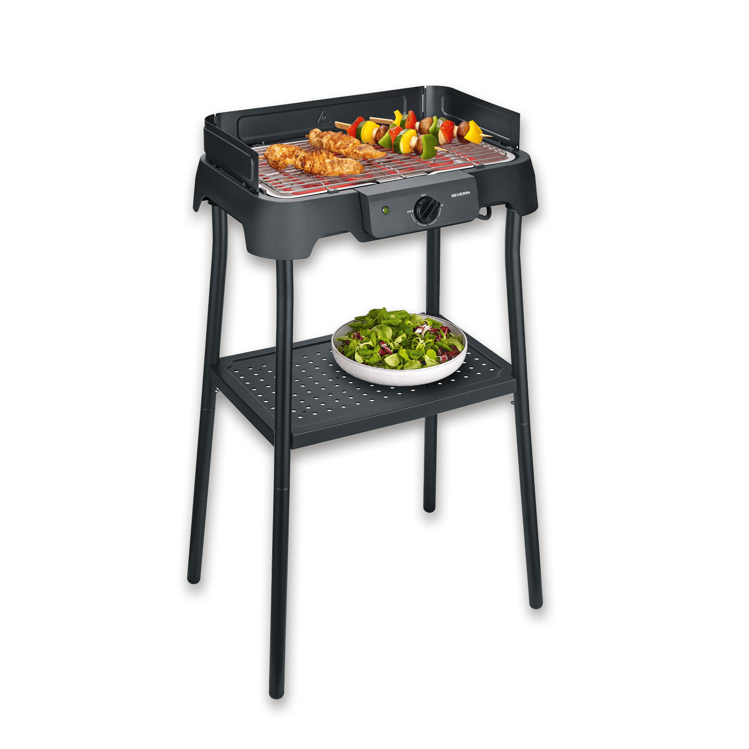 Ein elektrischer Grill mit Fleischspießen und Salat.