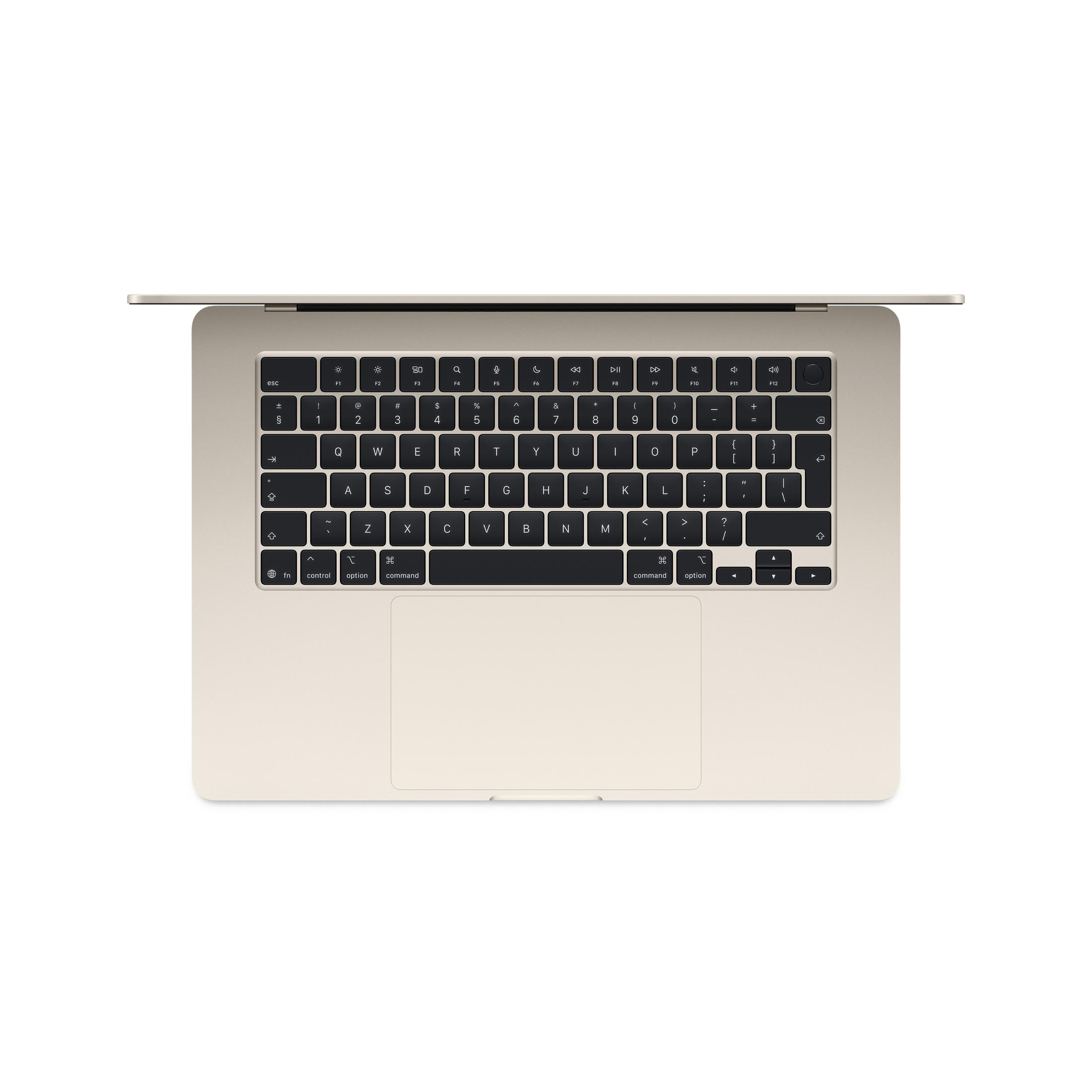 Vue de dessus d'un clavier et trackpad d'ordinateur portable beige. Fond blanc.