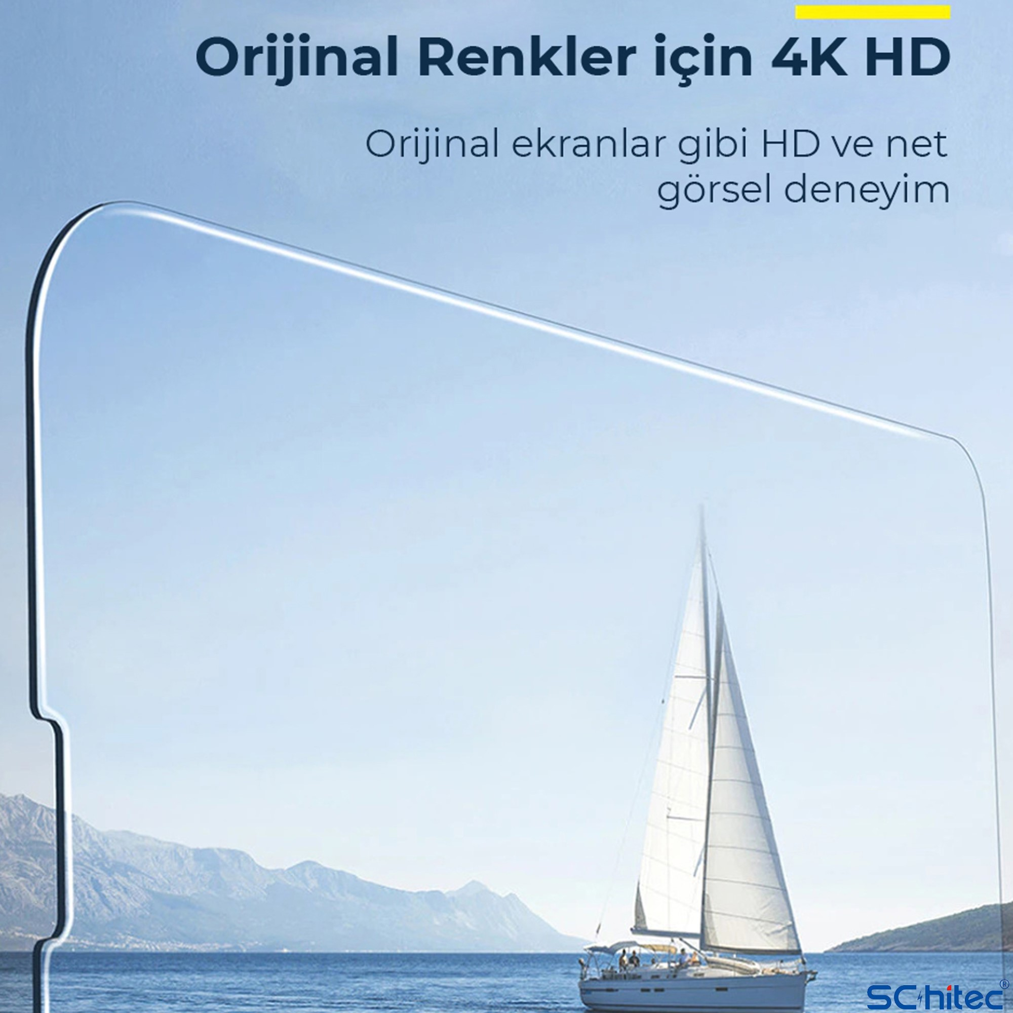 Dağlık kıyı önünde denizde yelkenli, metin bindirmesiyle.