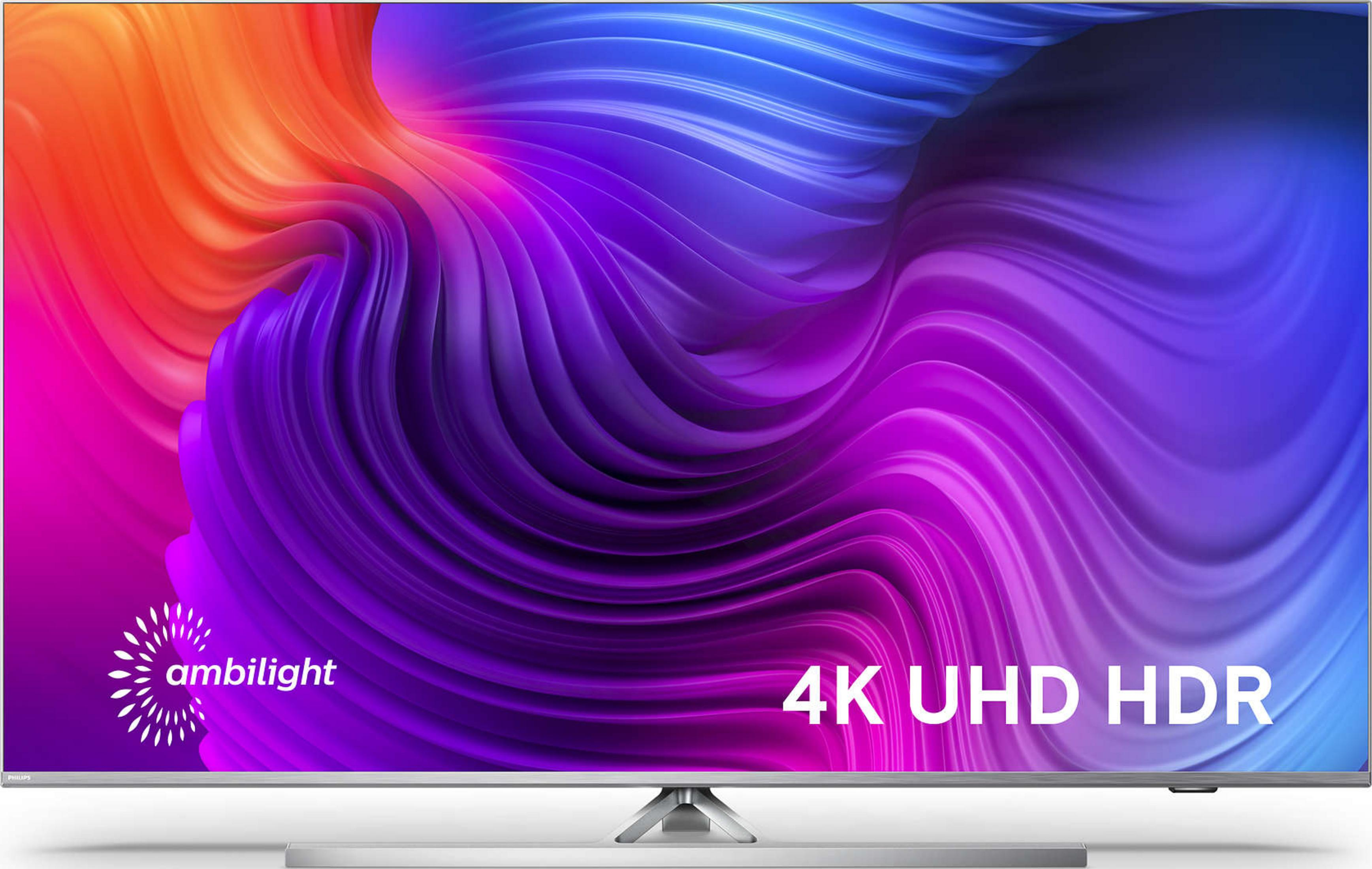 Een moderne televisie met een abstracte, kleurrijke achtergrond en "4K UHD HDR" tekst.