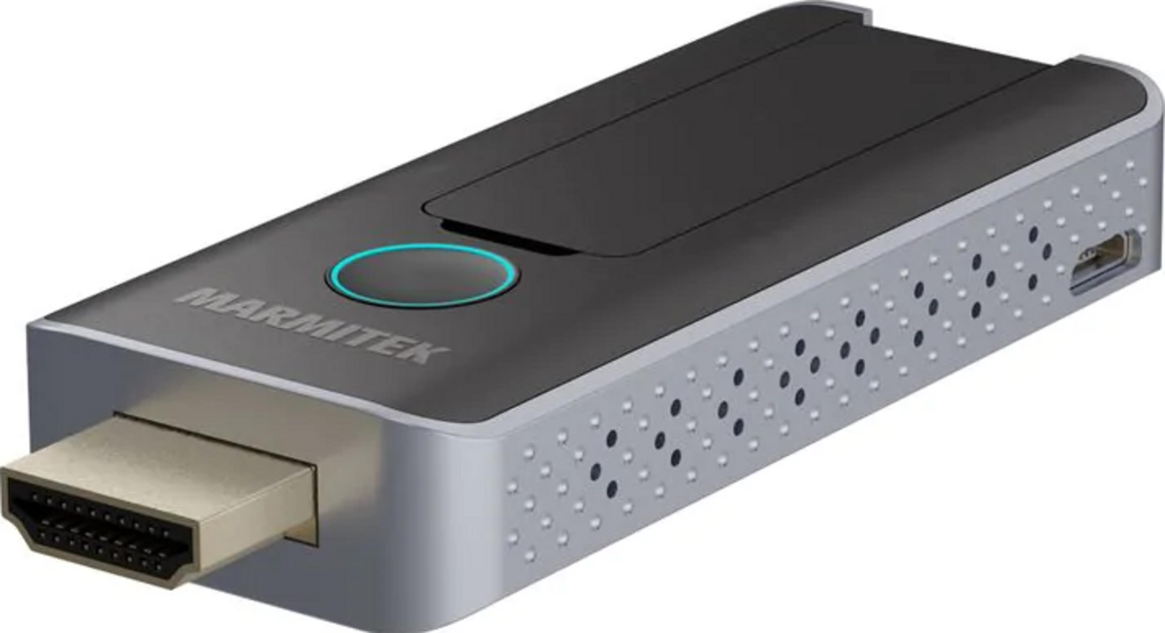 Un dongle HDMI negro y plateado con un botón azul brillante y orificios de ventilación.