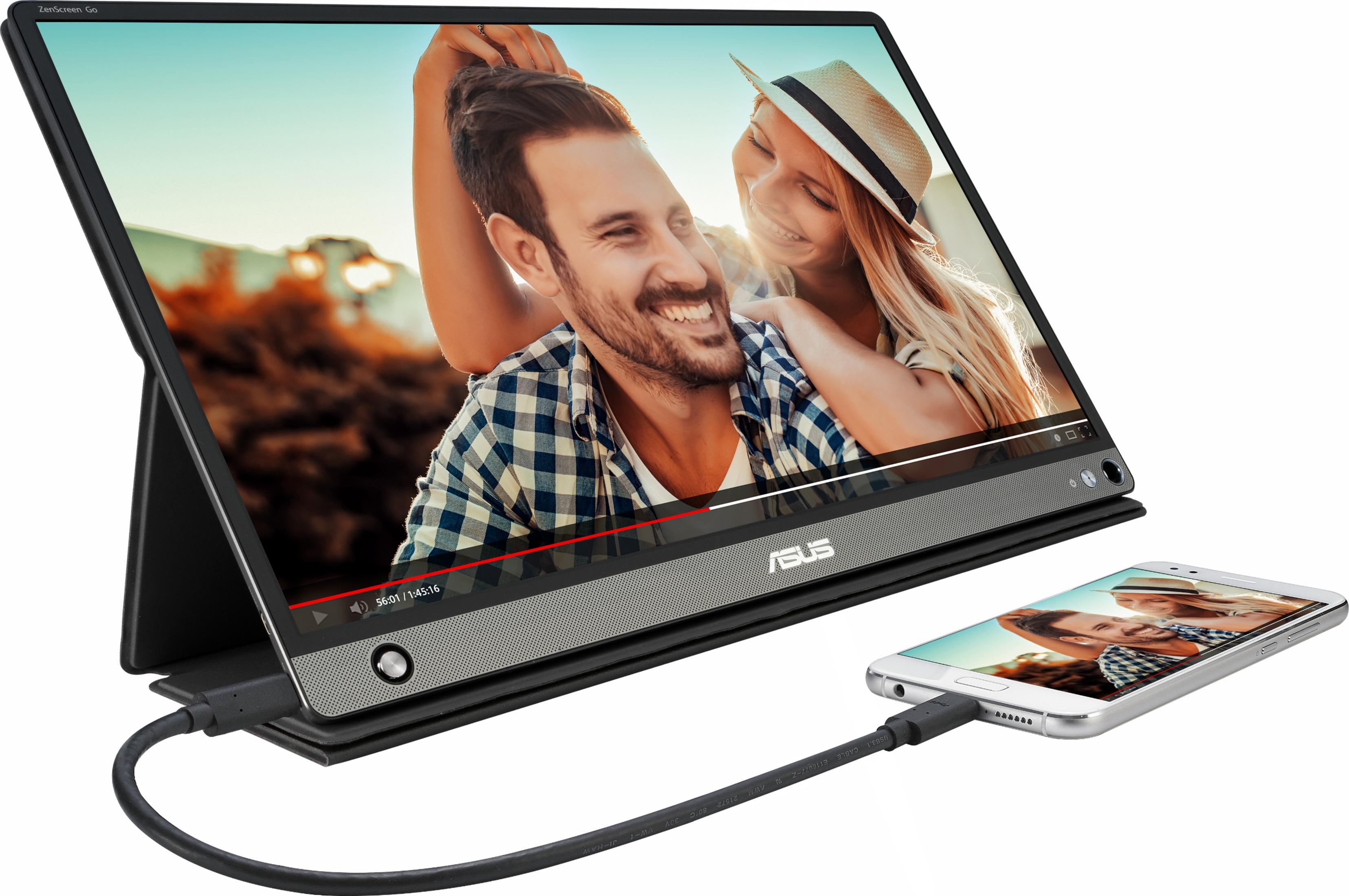 Ein Mann und eine Frau auf einem Laptop, verbunden mit einem Smartphone.
