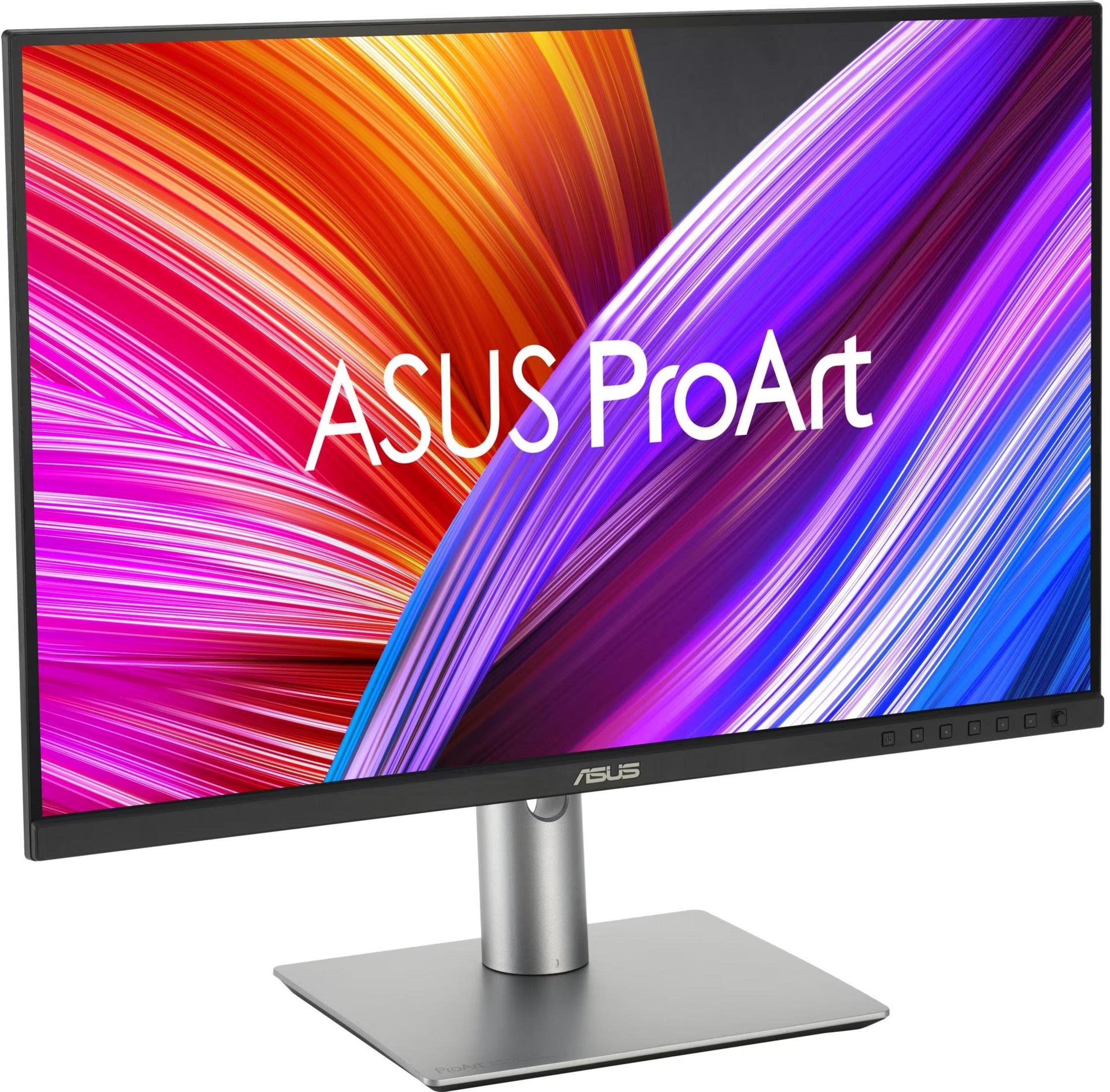 An ASUS ProArt monitor displaying a colorful abstract background, set on a silver stand.