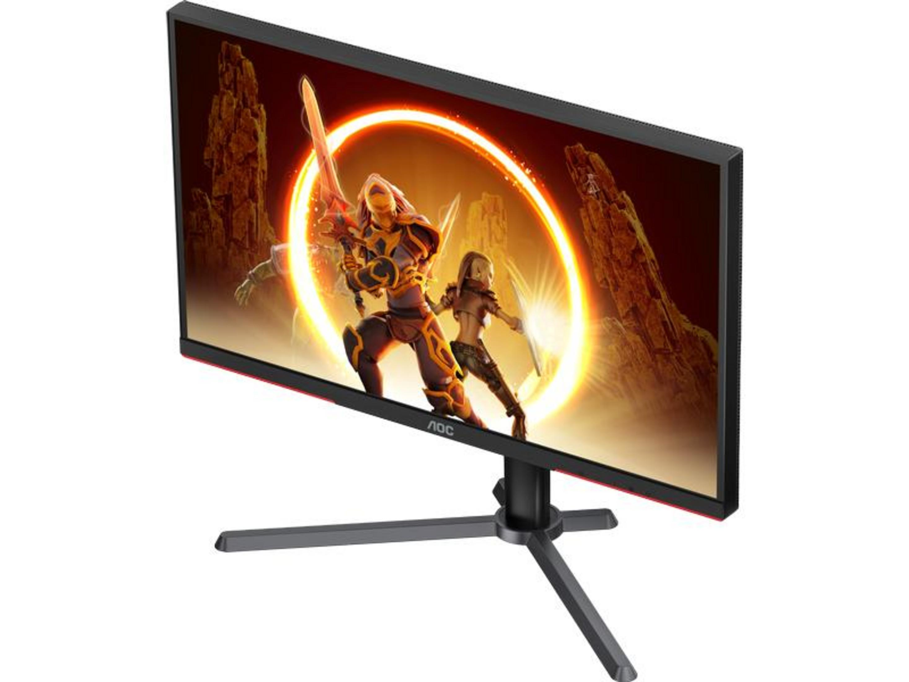 Un monitor AOC mostra una scena di gioco con guerrieri e un cerchio luminoso.