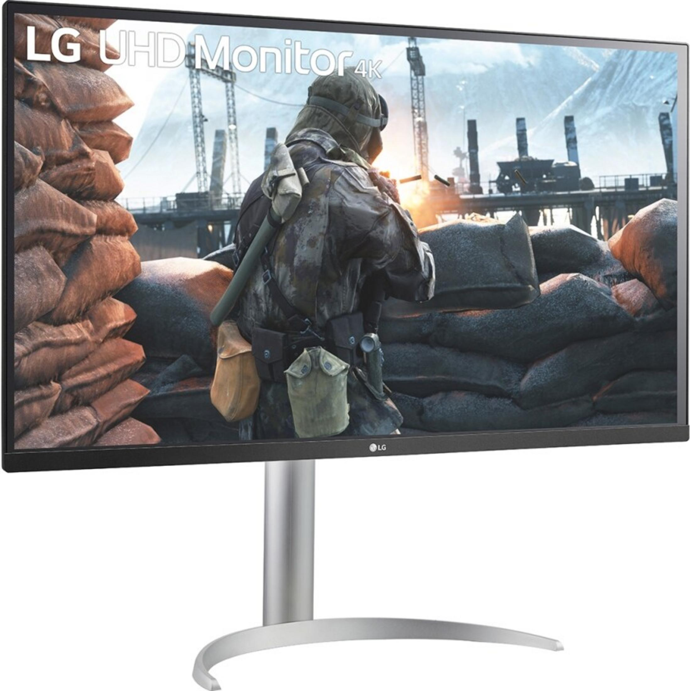 Monitor LG UHD 4K muestra soldado tras sacos de arena, escena distópica.