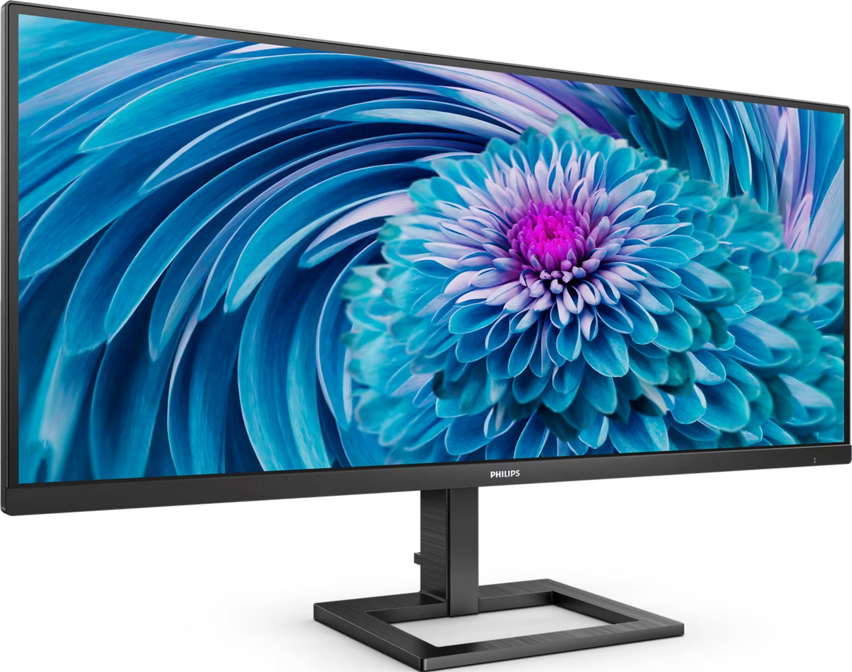 Un moderno monitor Philips con un motivo floreale blu e rosa sullo schermo.