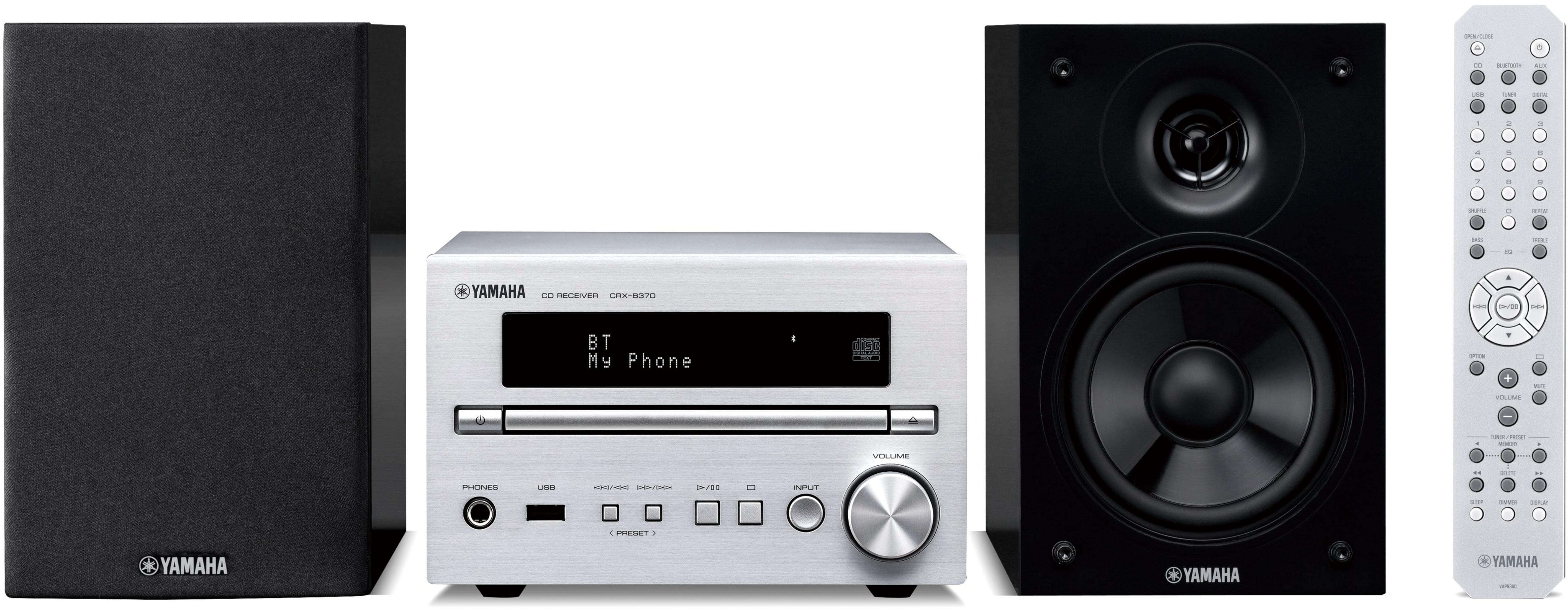 Yamaha Stereoanlage mit zwei Lautsprechern, CD-Receiver und Fernbedienung.
