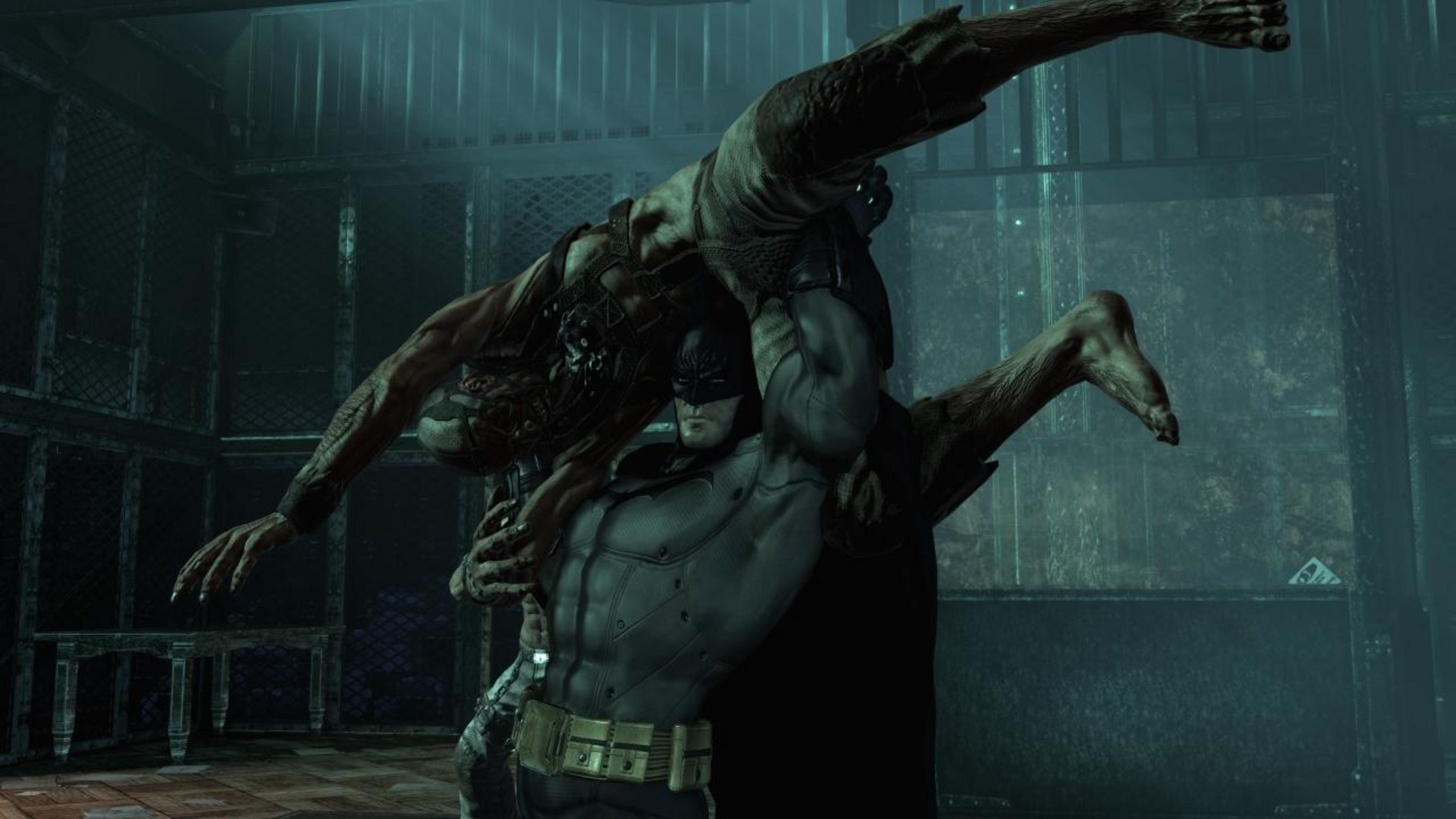 Batman tiene un nemico mostruoso in una stanza buia e sporca.