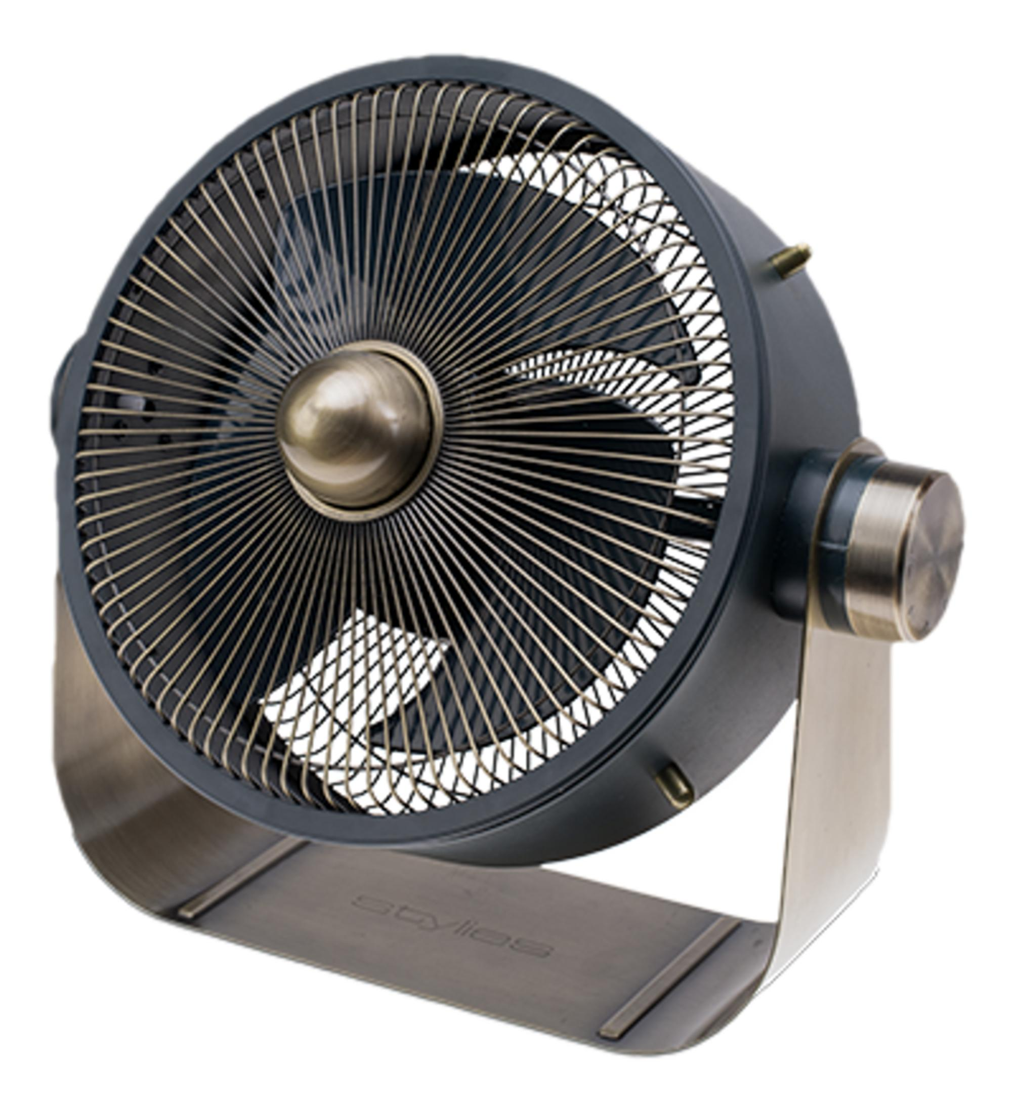 Ein dunkler Ventilator mit Messinggitter und Sockel.