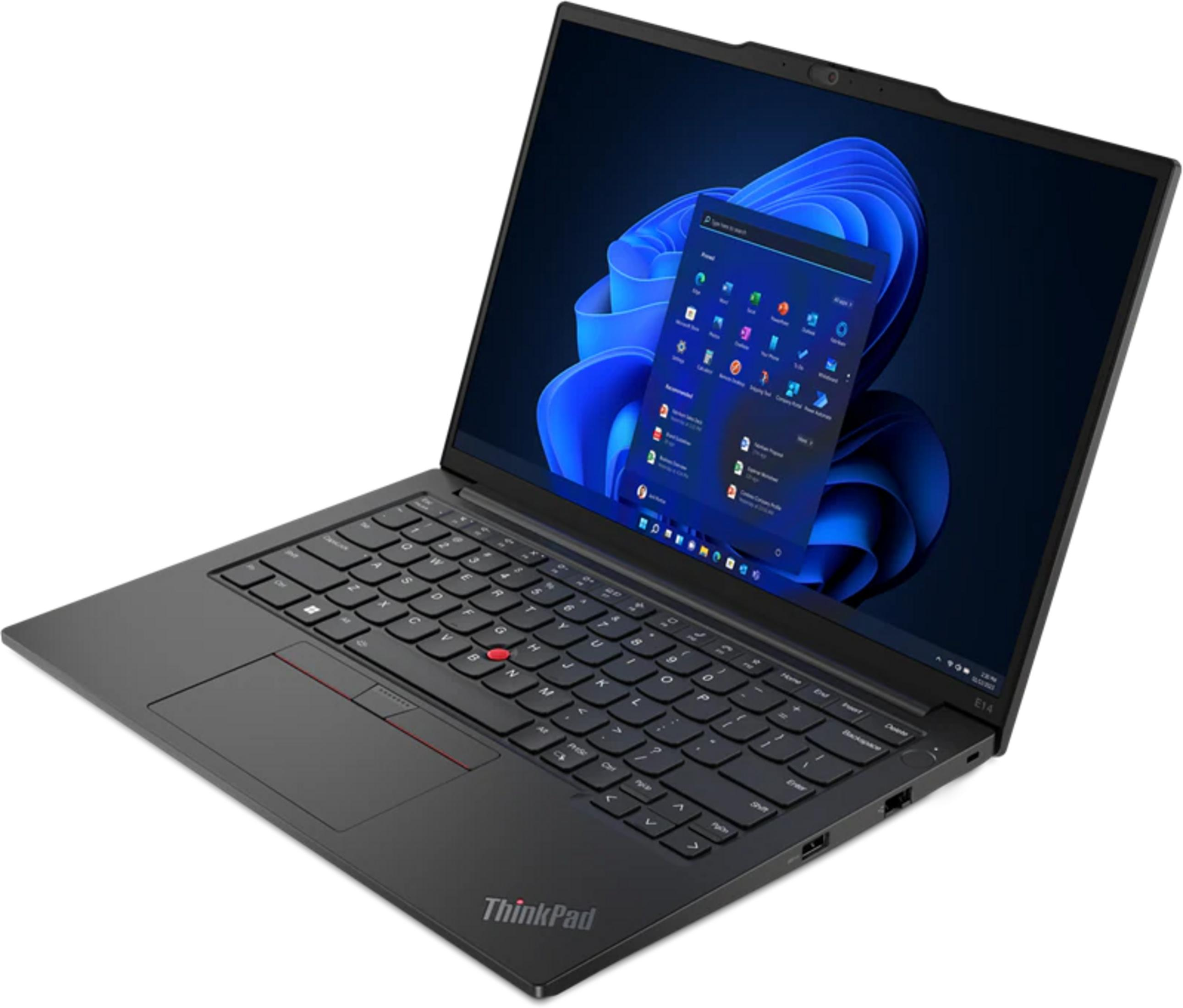 Czarny laptop z podświetlaną klawiaturą i menu Start systemu Windows na ekranie.