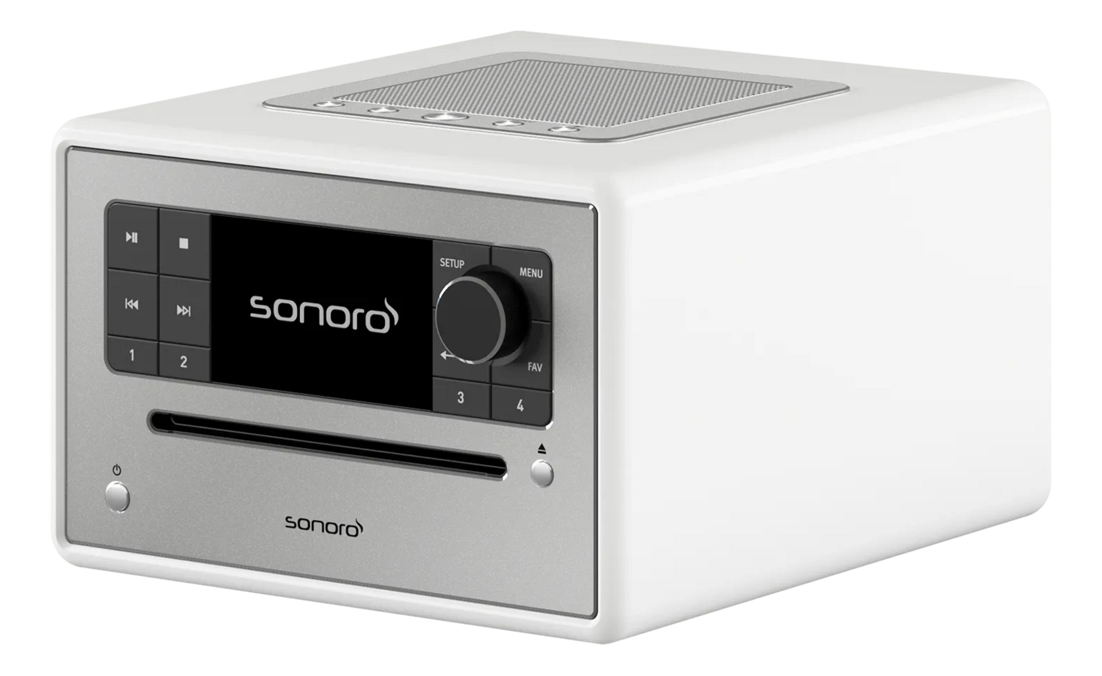 Een witte Sonoro radio met CD-speler, zwart scherm en zilveren bedieningselementen.