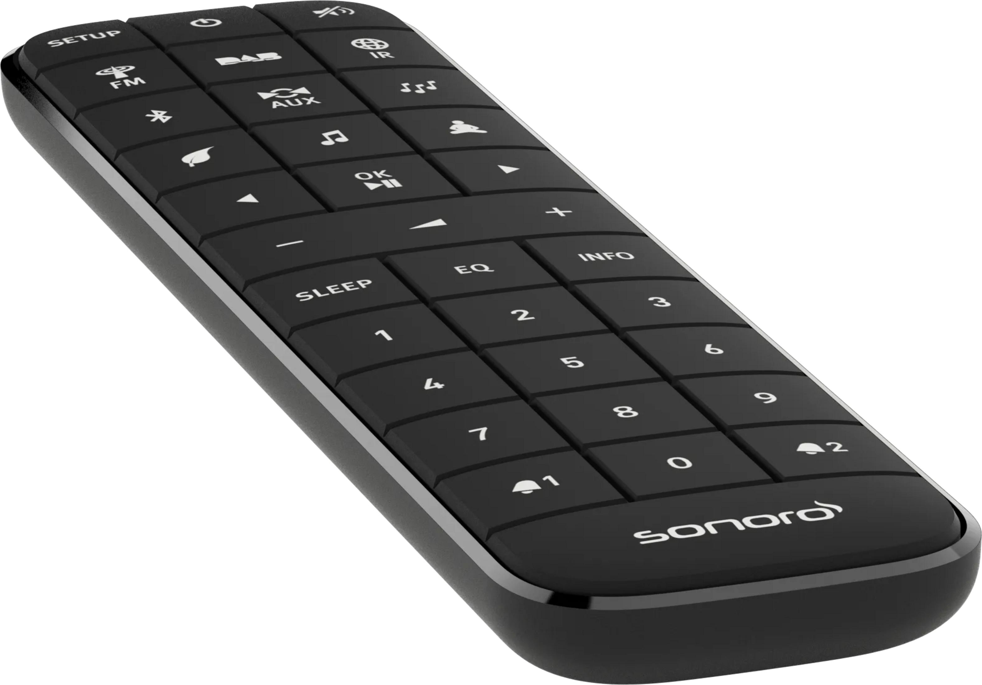 Black remote control with buttons for Setup, FM, Aux, Sleep, EQ, Info, and numbers.