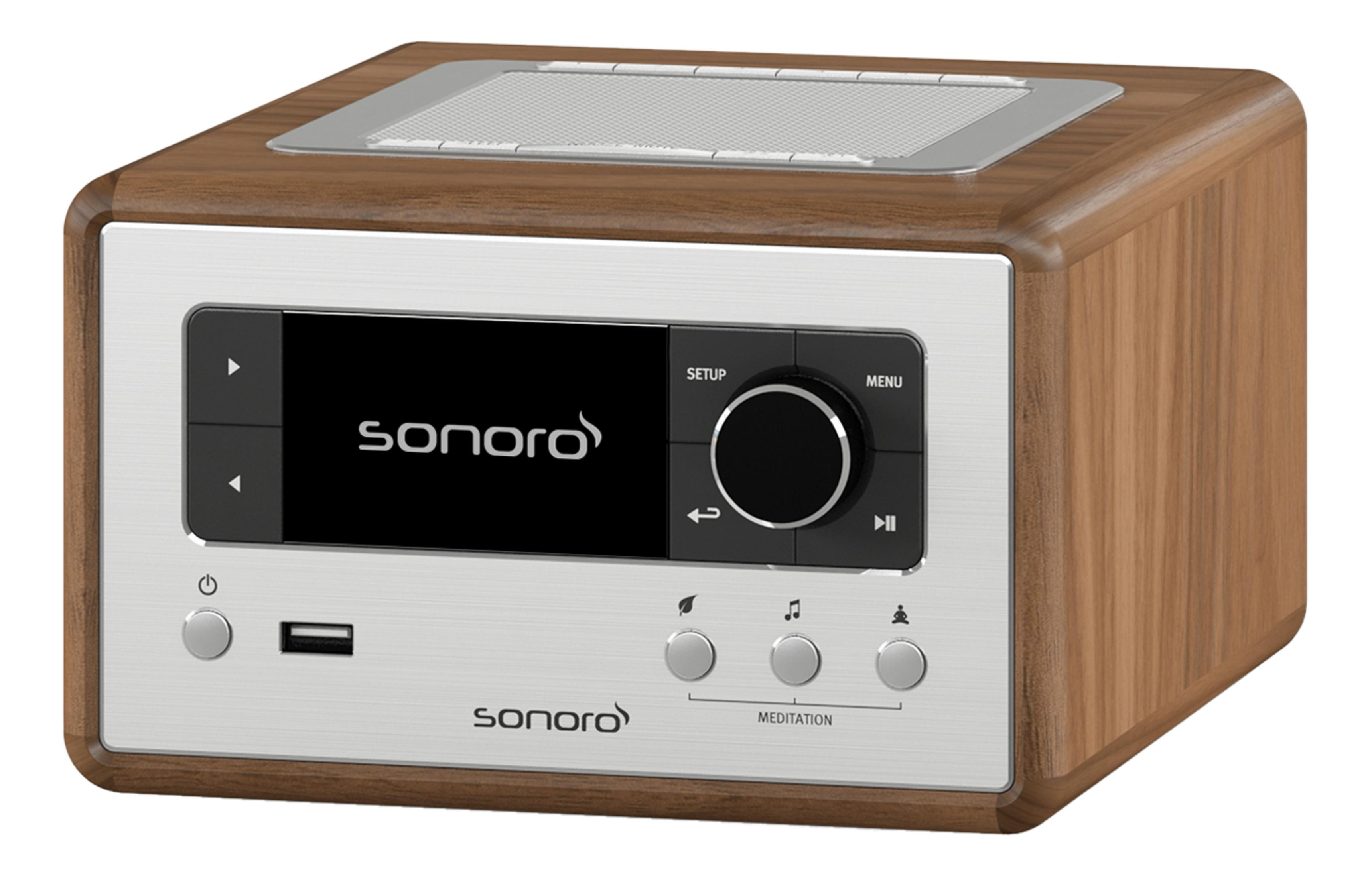 Wooden radio with silver front, black screen, and control buttons.