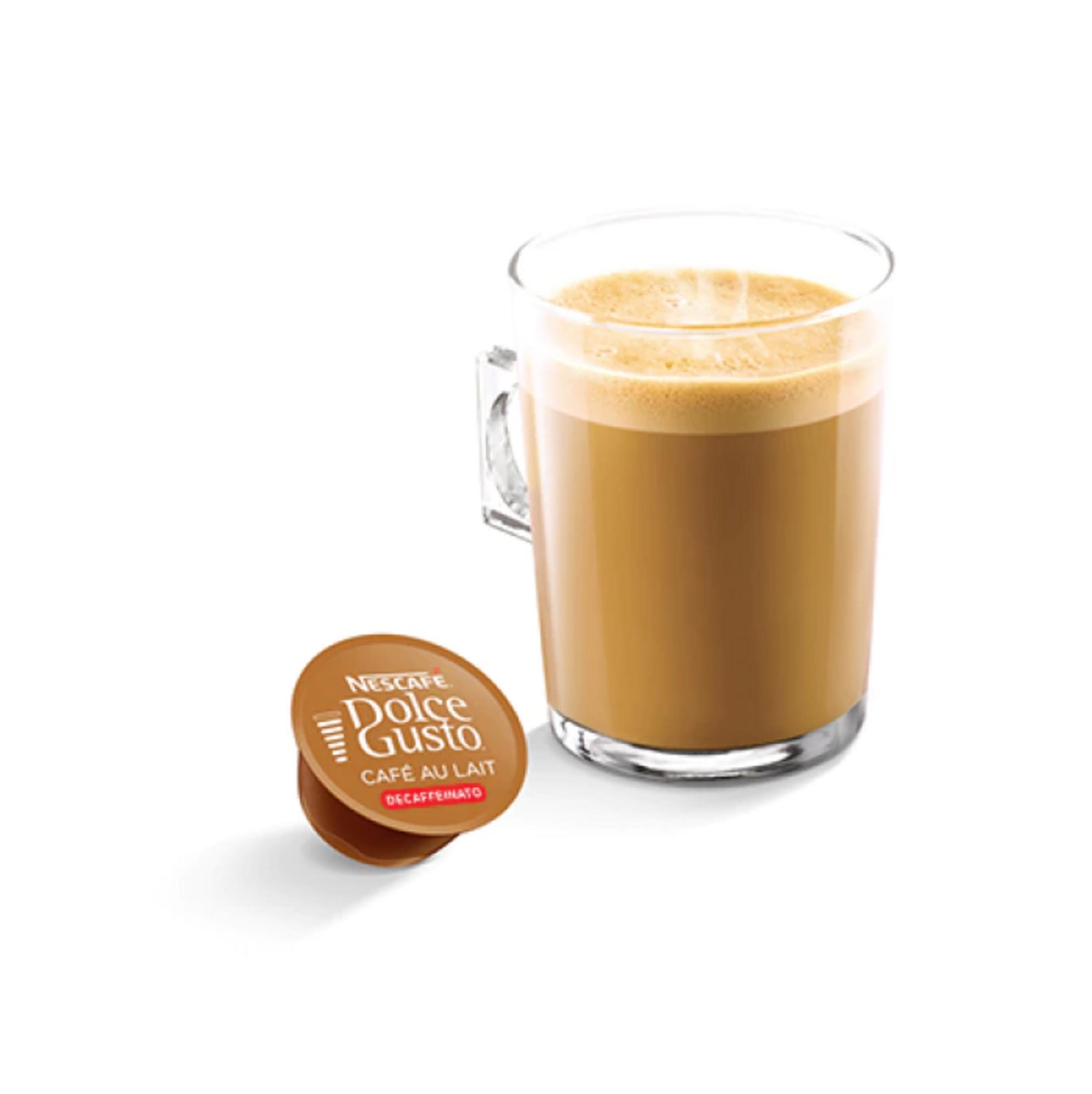 Una tazza di vetro con caffè e una capsula di caffè accanto.