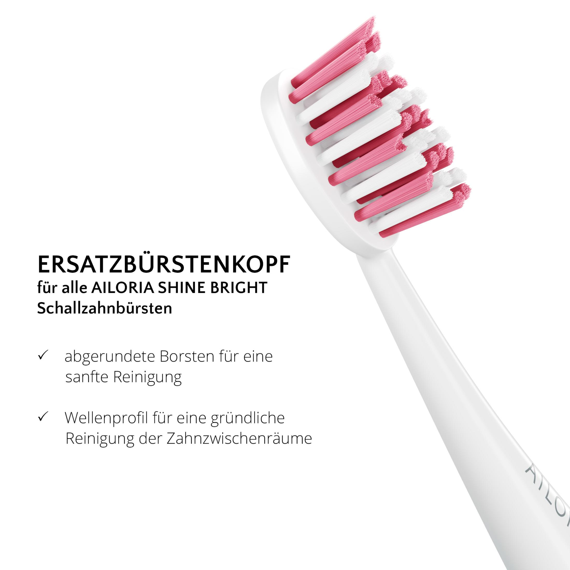Ein weißer Schallzahnbürstenkopf mit rosa und weißen Borsten.