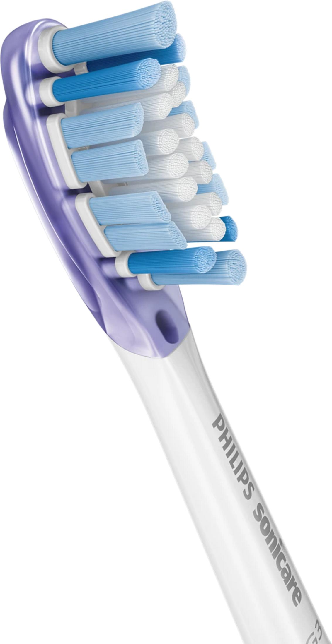 Primer plano de un cabezal de cepillo de dientes Philips Sonicare con cerdas azules y blancas.