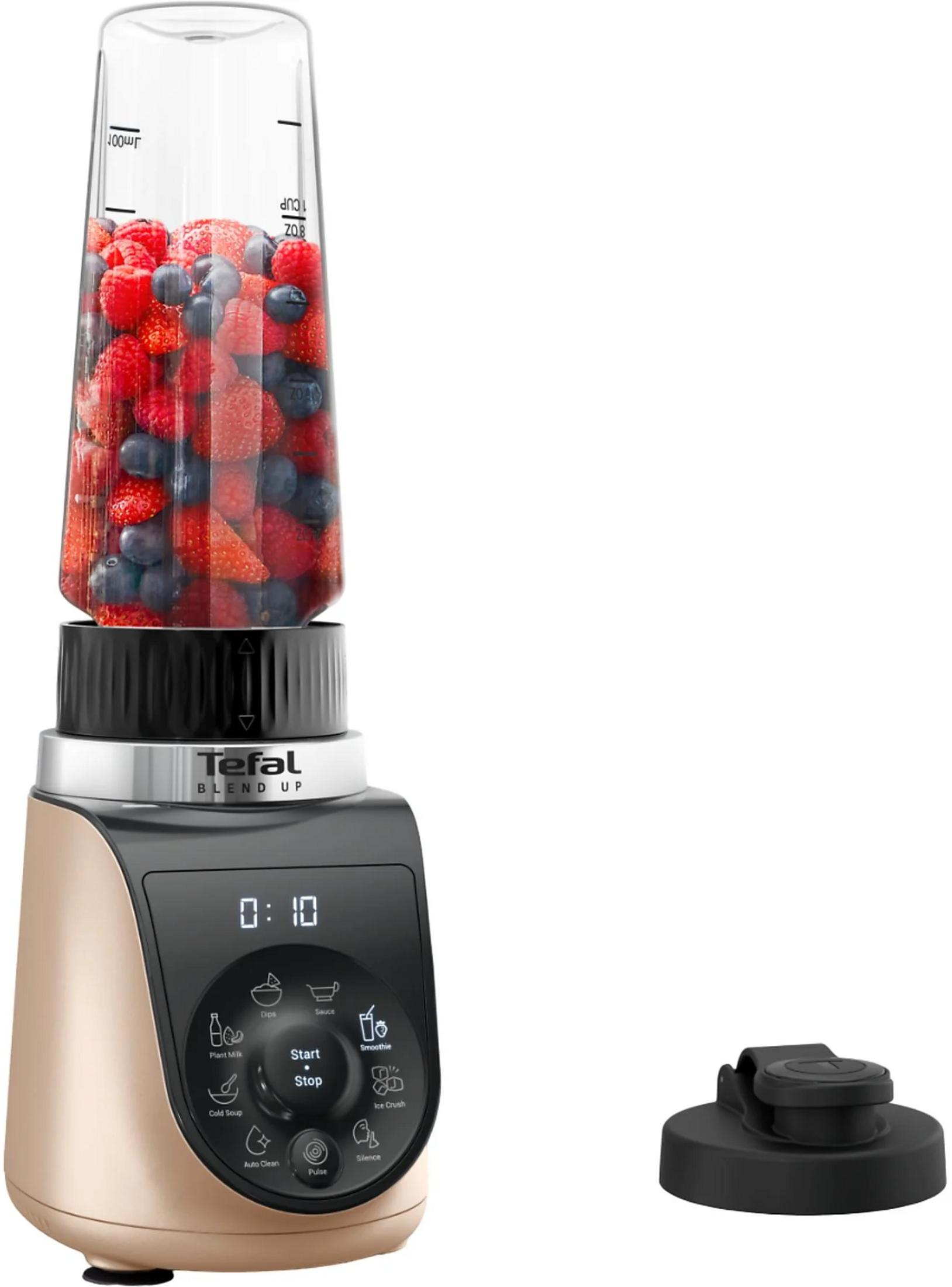 Ein Tefal Blend Up Mixer mit einer Tasse voller Beeren und einem separaten schwarzen Deckel.