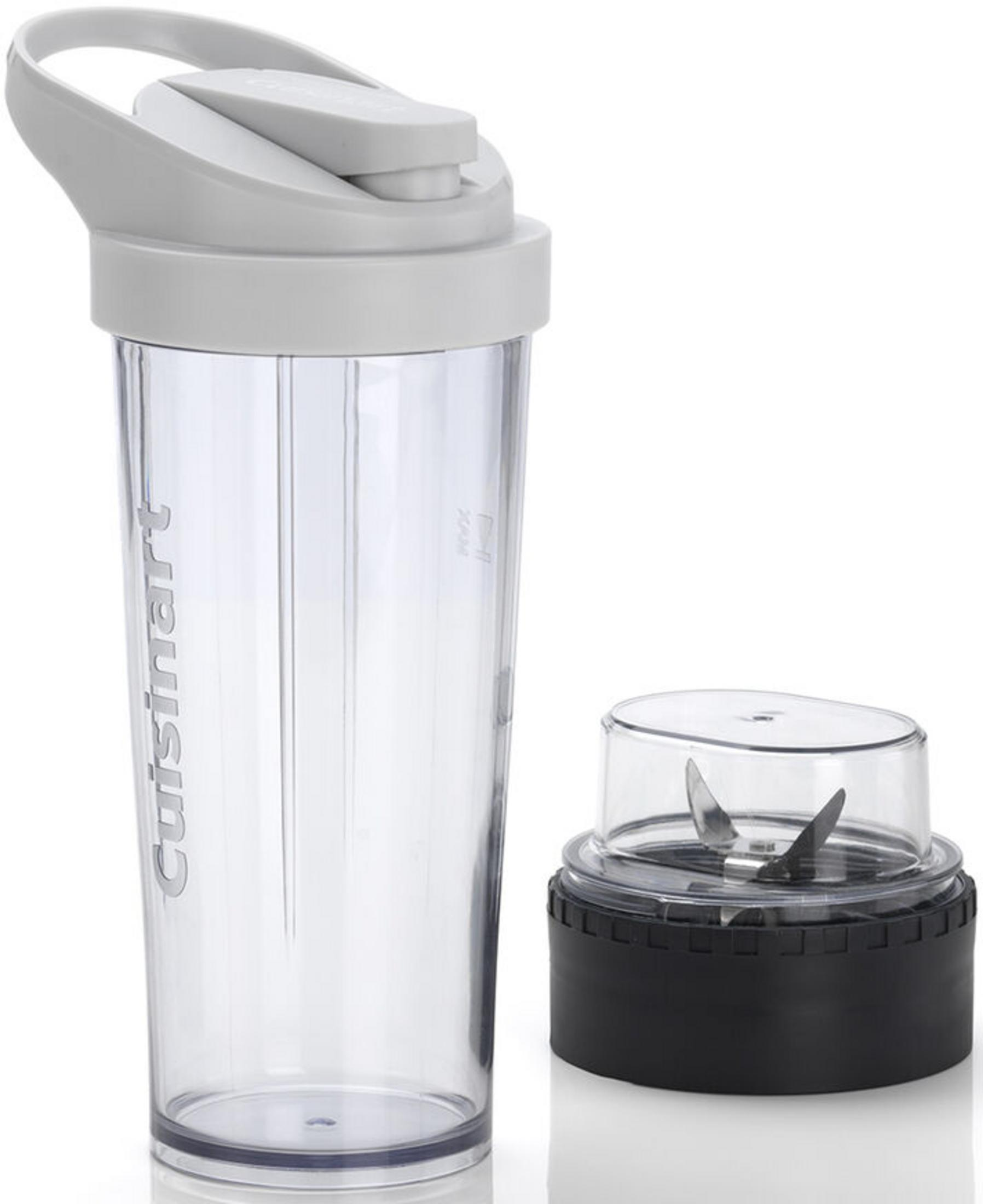 Un vaso transparente con tapa gris y un accesorio de cuchillas.