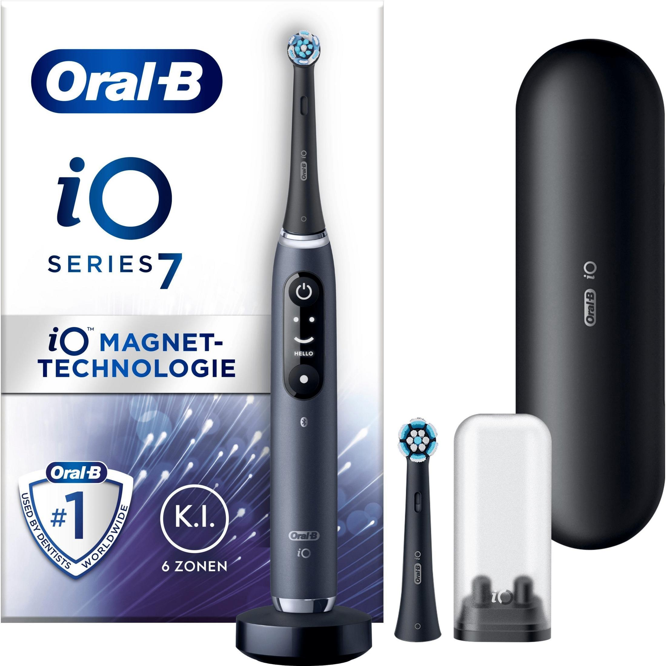 Spazzolino elettrico Oral-B iO Series 7 grigio scuro con custodia da viaggio nera e testina di ricambio.