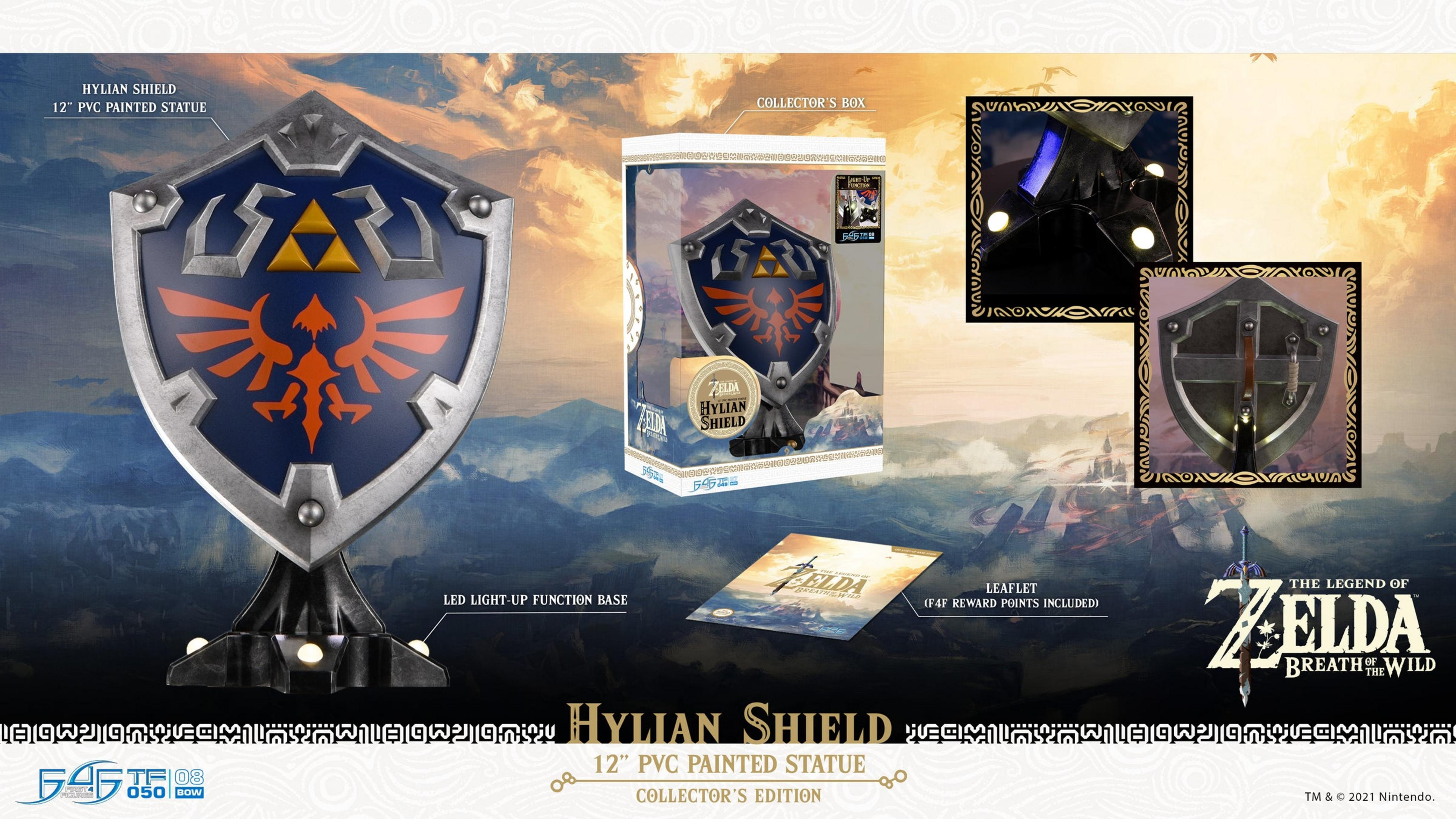 Hylian Schild Statue mit Box, Beilage und Leuchtbasis vor Berglandschaft.