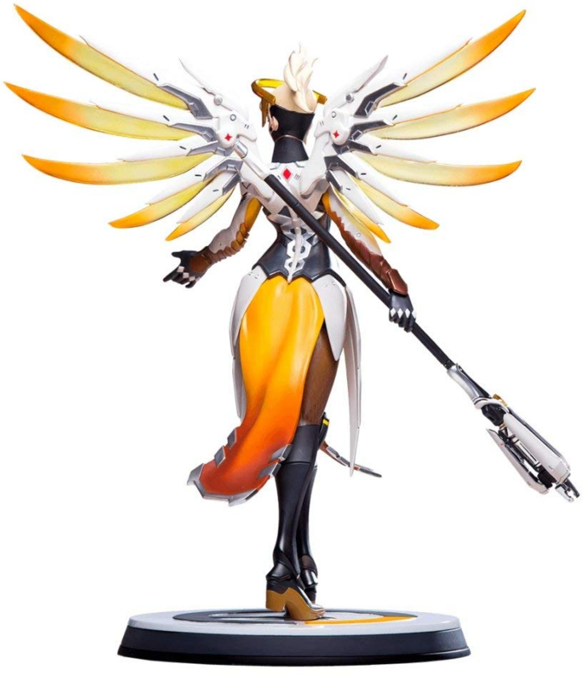 Eine detaillierte Figur von Mercy aus Overwatch, mit weißen und orangen Flügeln, die einen Stab hält.