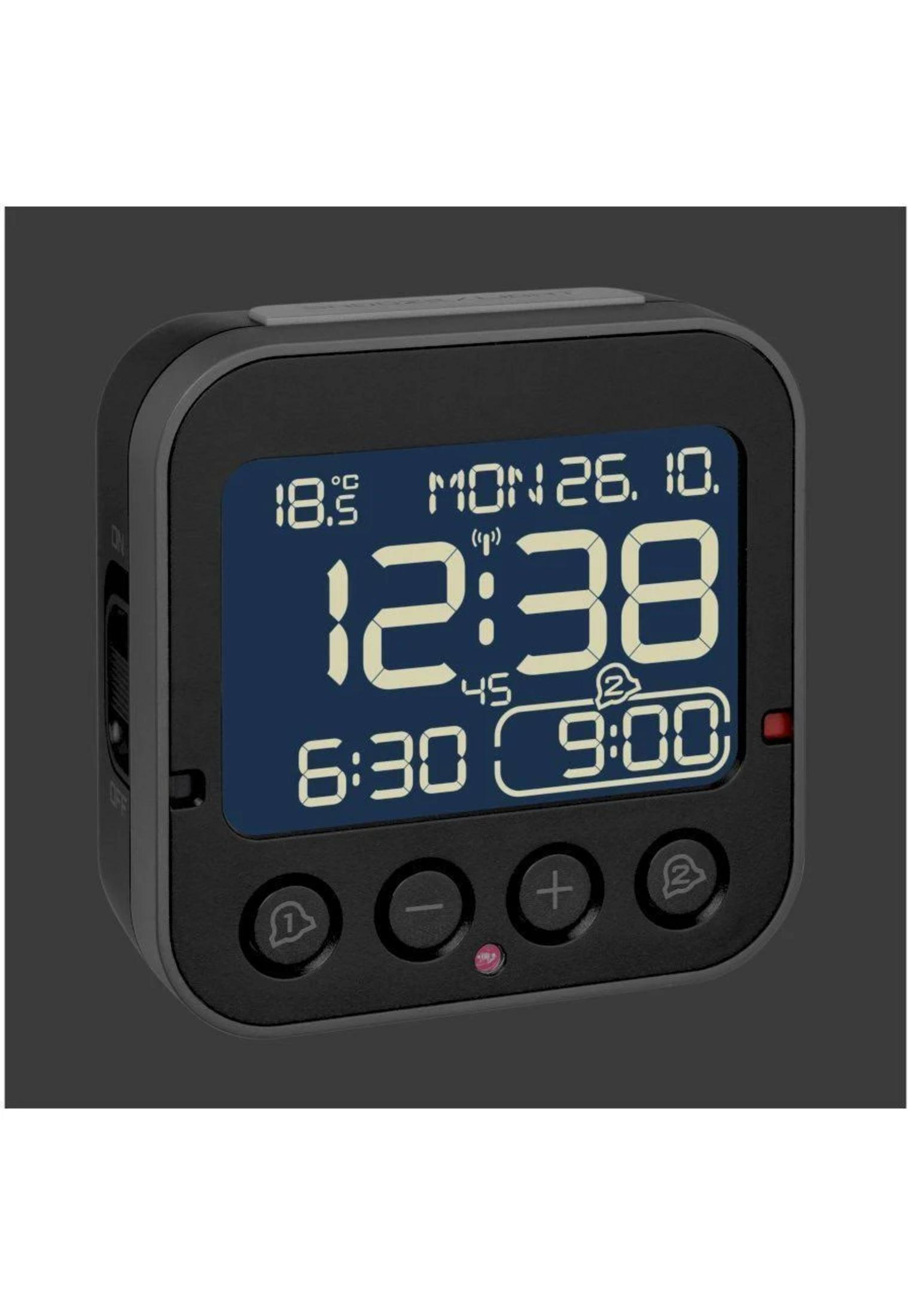 Ein schwarzer digitaler Wecker zeigt 18,5 Grad, Montag 26.10., 12:38 Uhr und 6:30 / 9:00 an.