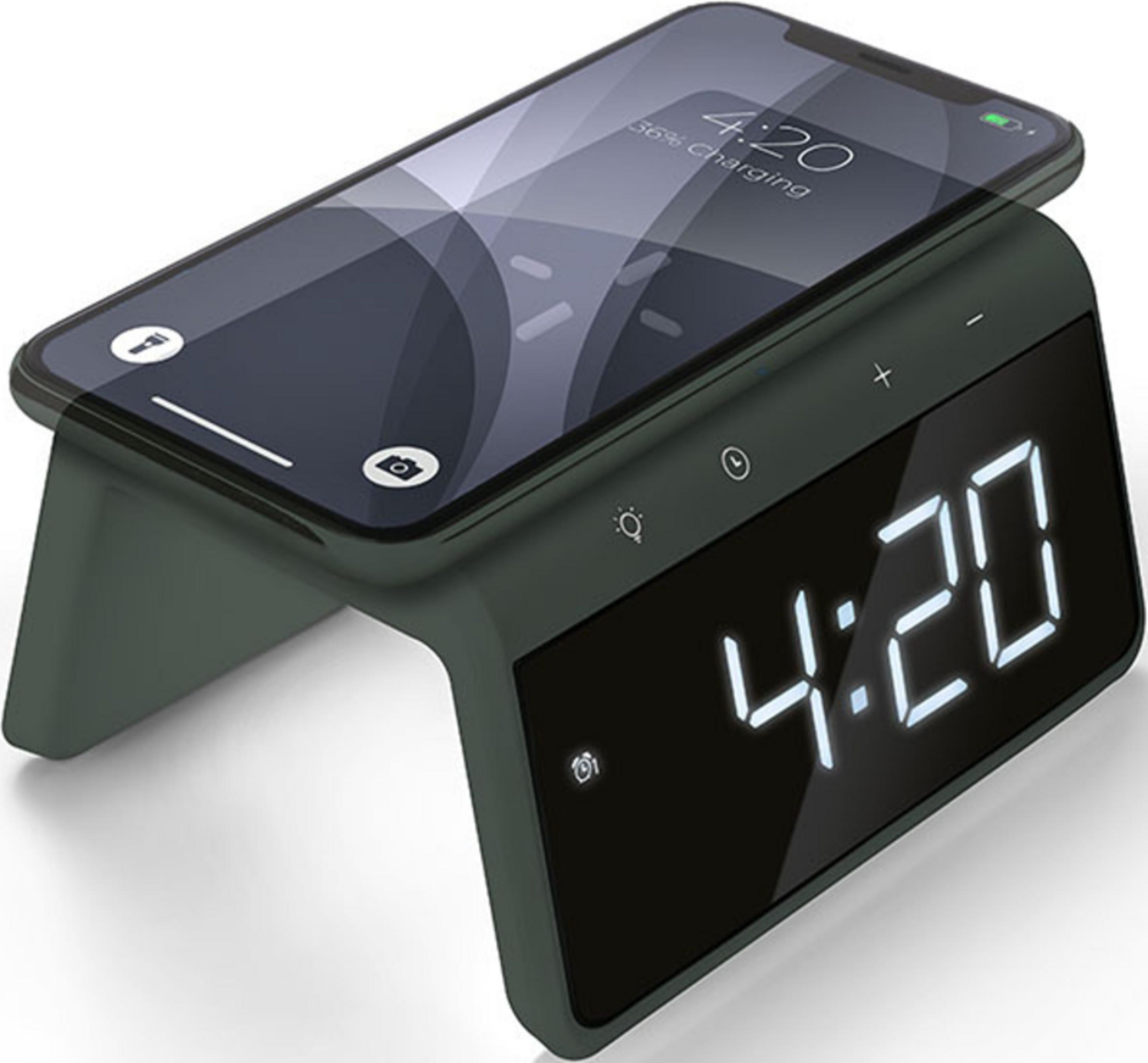 A dark charging stand with a smartphone lying on it, displaying 4:20.