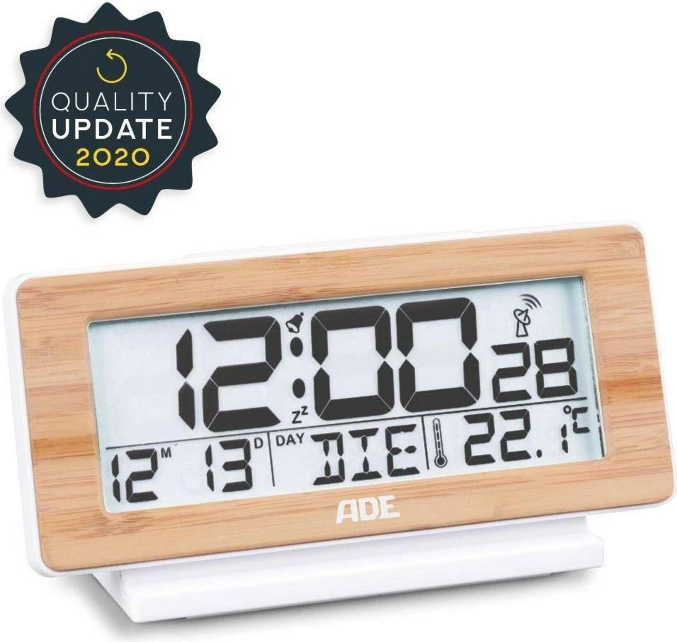 Digitaluhr mit Holzrahmen zeigt 12:00 Uhr, 28°C, 13. Tag und 22,1°C.