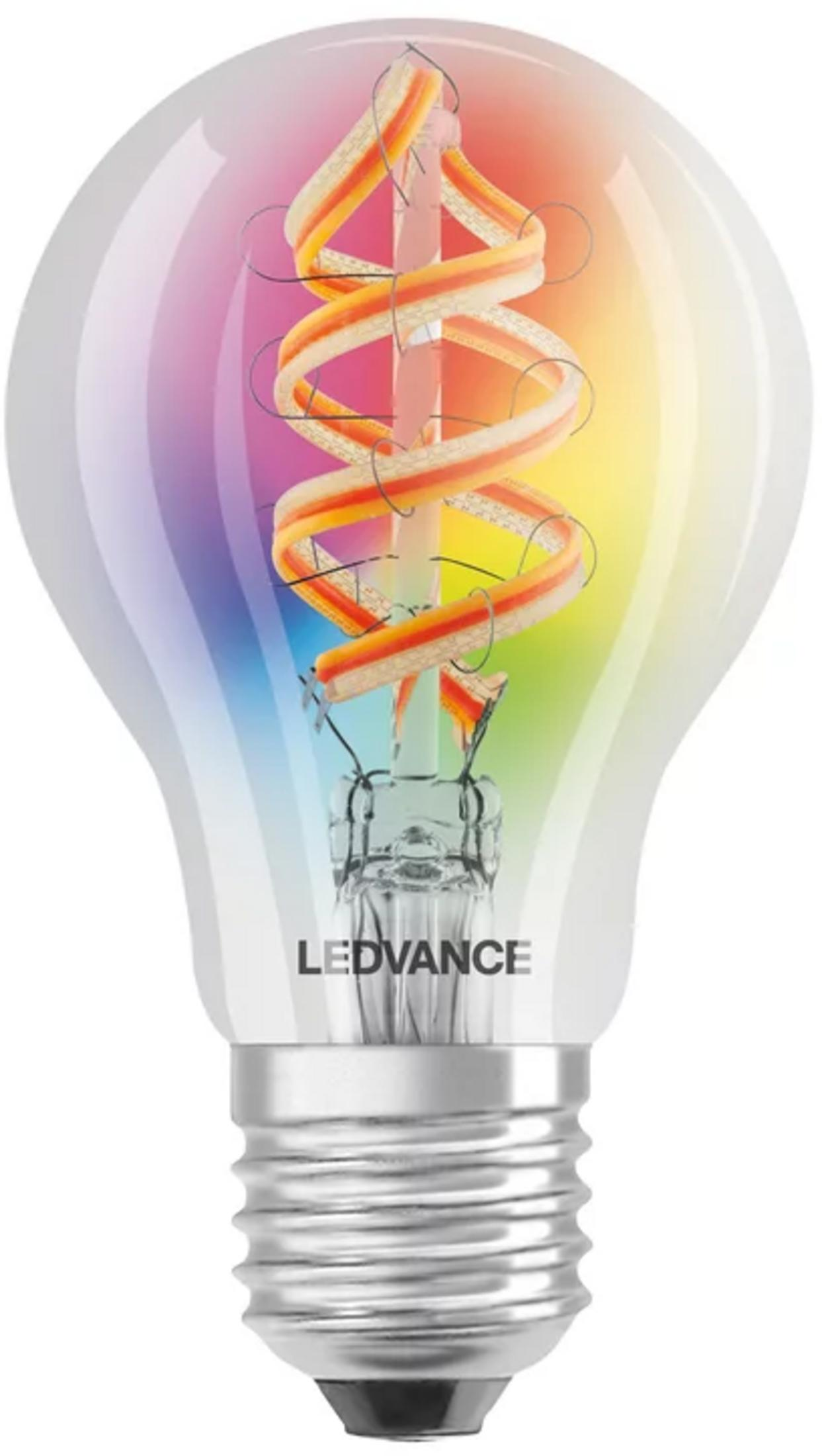 Lampadina LEDVANCE trasparente con filamento a spirale colorato, che mostra sfumature arcobaleno.