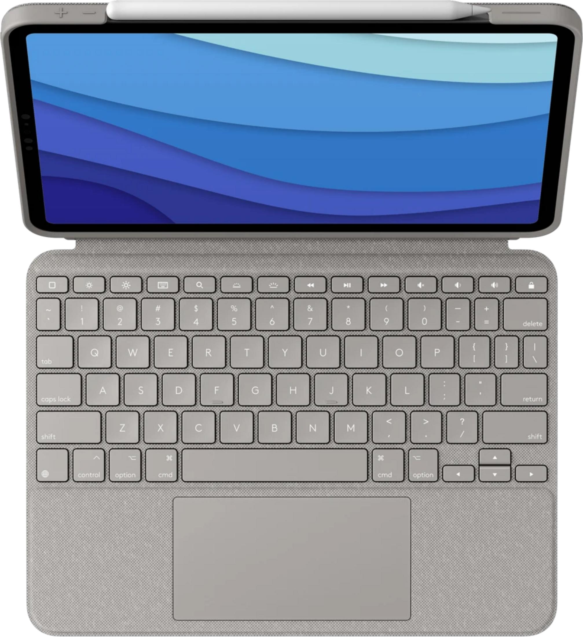 Tablet grigio con tastiera e pennino, sfondo blu.