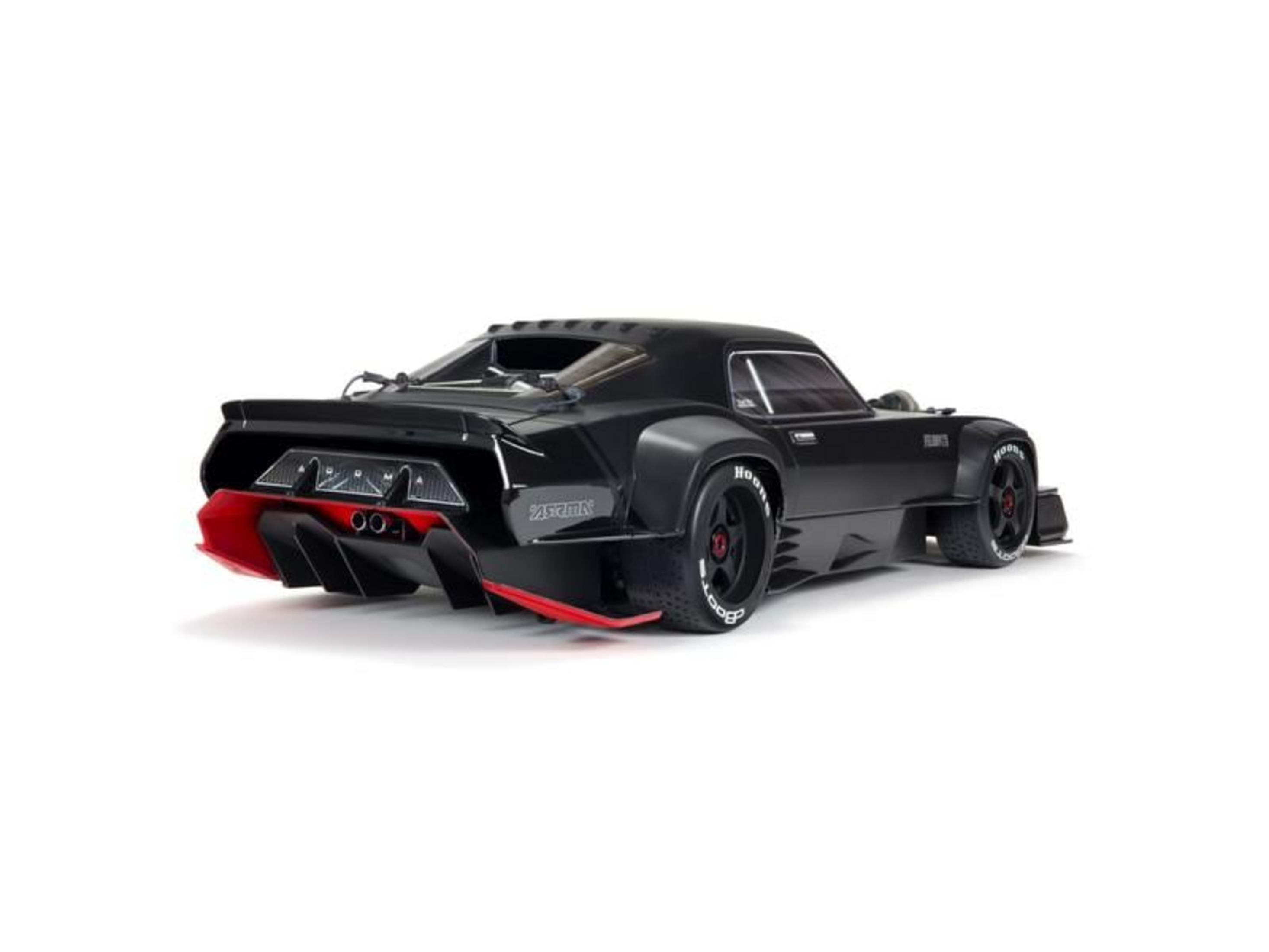 Voiture télécommandée noire avec accents rouges, vue latérale.