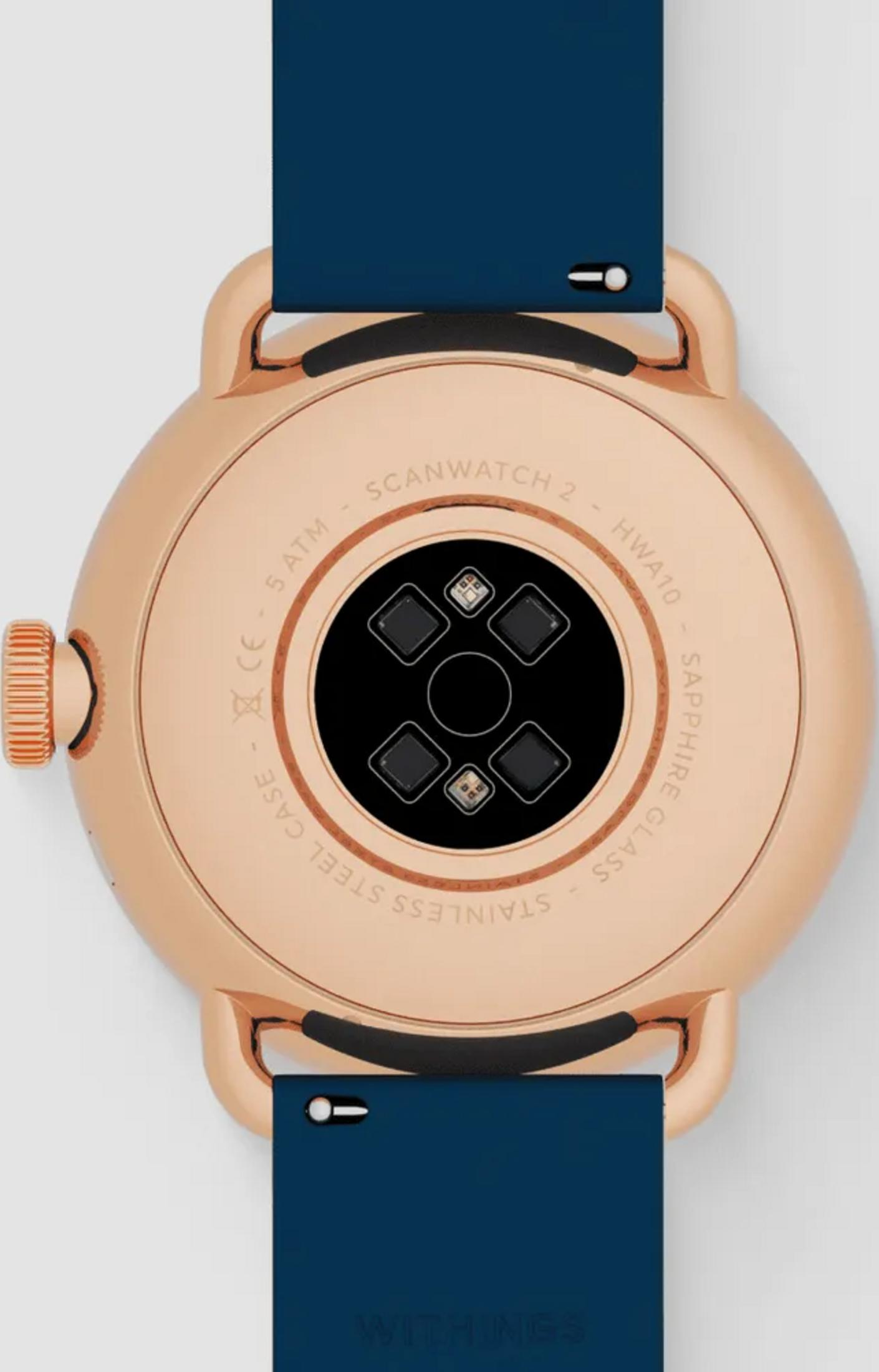 Rückseite einer goldenen Smartwatch mit blauem Armband, Herzfrequenzsensoren.