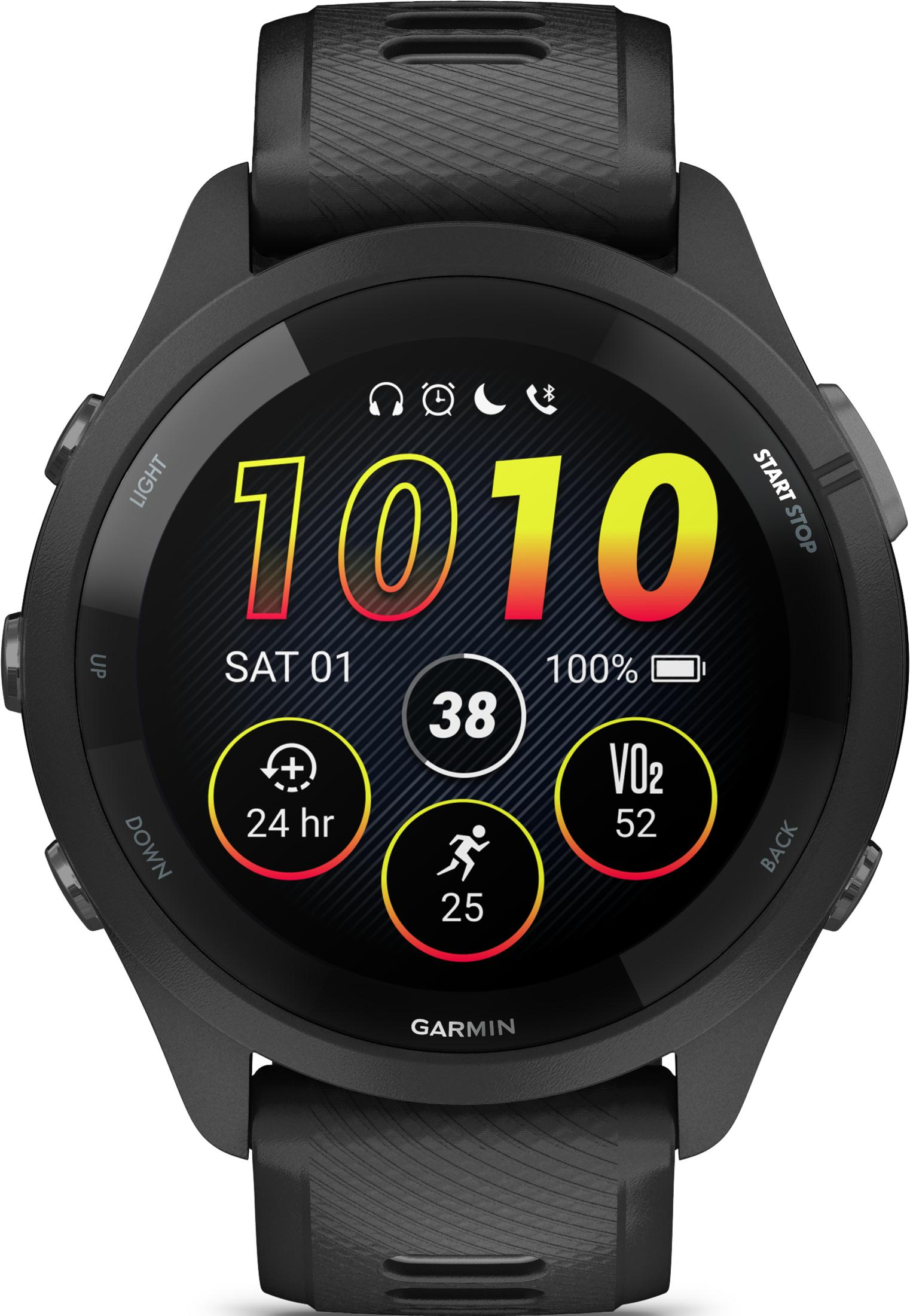 Reloj Garmin negro muestra hora 10:10, Sáb 01, batería 100%, pulso 38, 24h, VO2 52, pasos 25.