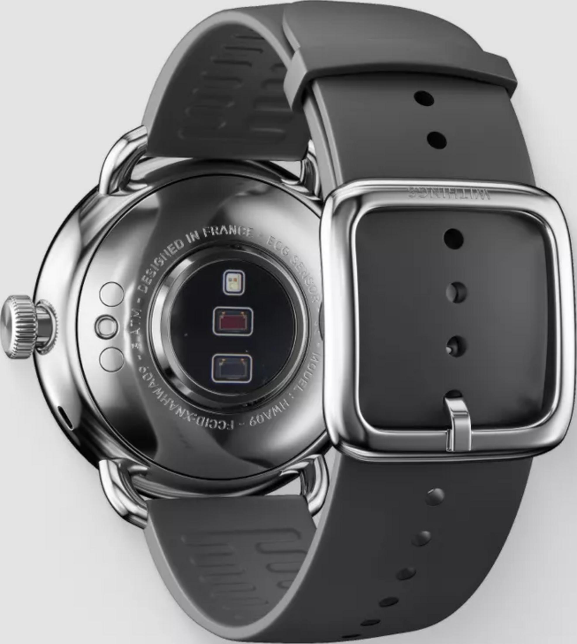 Rückansicht einer silbernen Smartwatch mit dunkelgrauem Armband und EKG-Sensor.