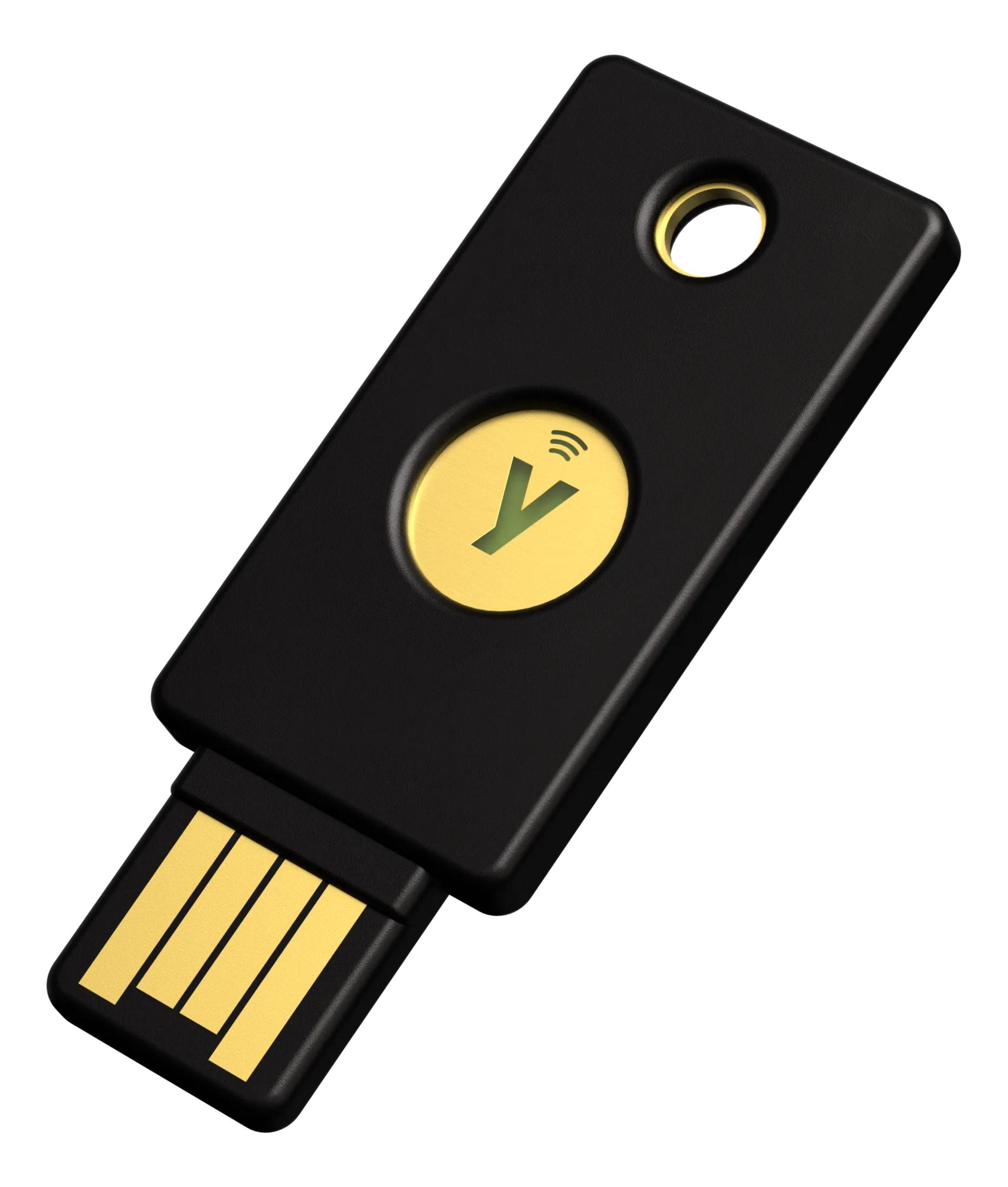 Ein schwarzer USB-Sicherheitsschlüssel mit einem goldenen Kreis und einem grünen Y-Symbol.