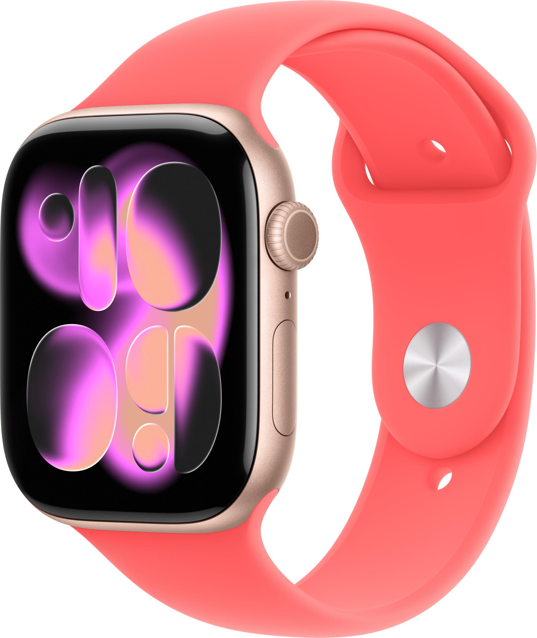 Eine goldfarbene Smartwatch mit einem leuchtend korallenroten Armband und einem bunten Zifferblatt.