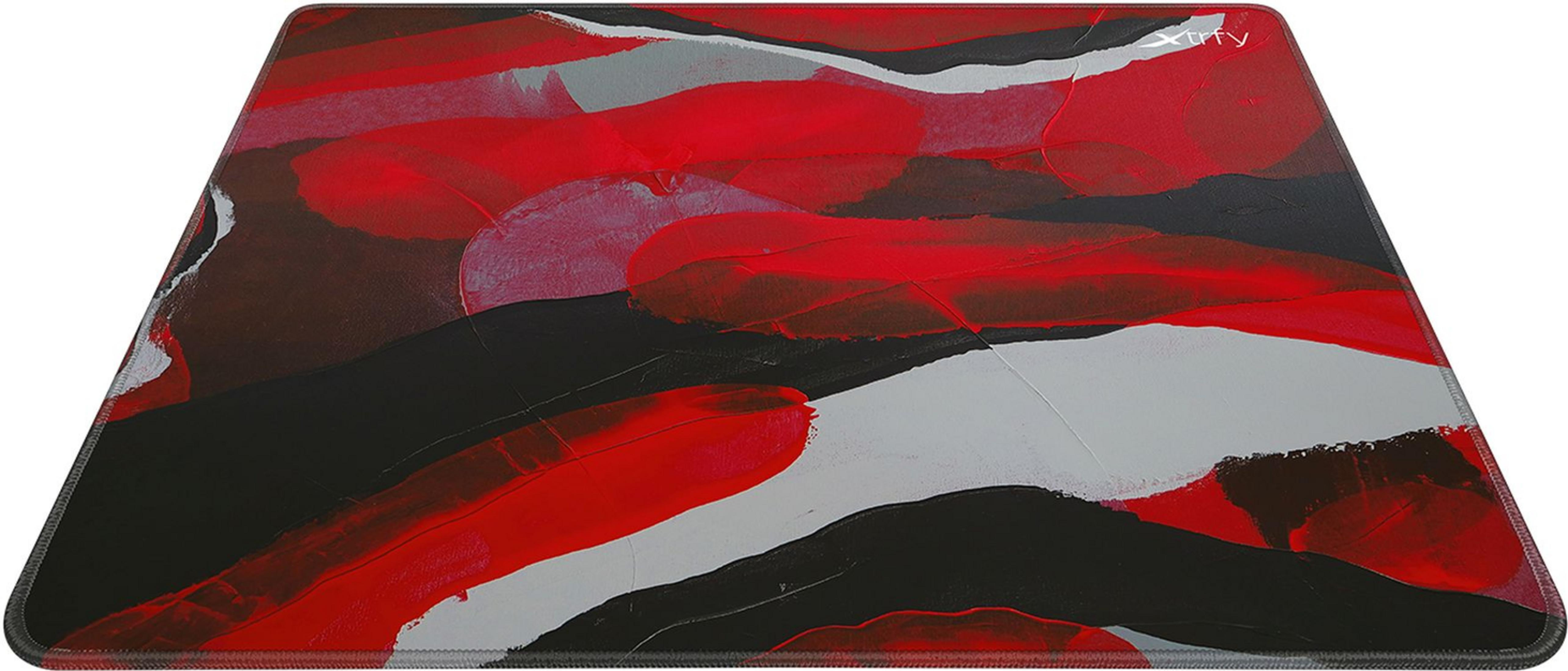 Un tapis de souris noir avec un motif abstrait de coups de pinceau rouges, gris et marron.