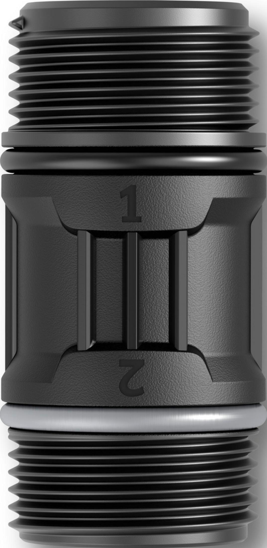 Czarny cylinder z żebrami i cyframi 1 i 2.