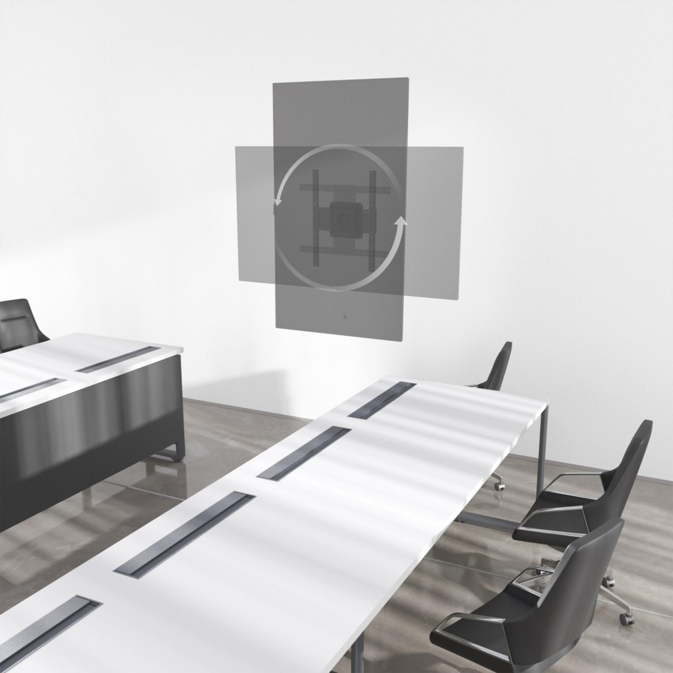 Konferenzraum mit weißem Tisch, schwarzen Stühlen und Wandhalterung für Monitor.