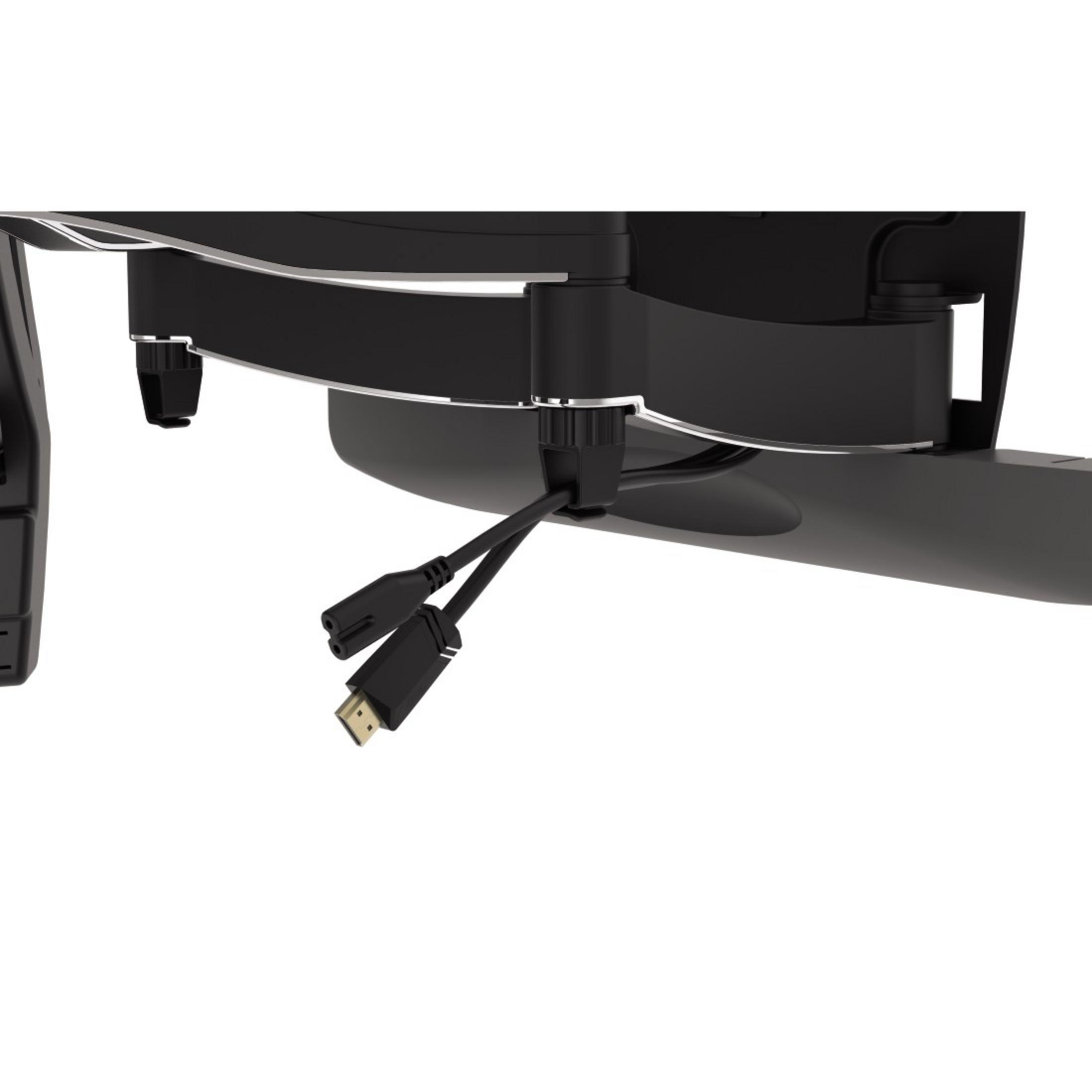 Czarne kable z wtyczkami HDMI zwisają z czarnego urządzenia.