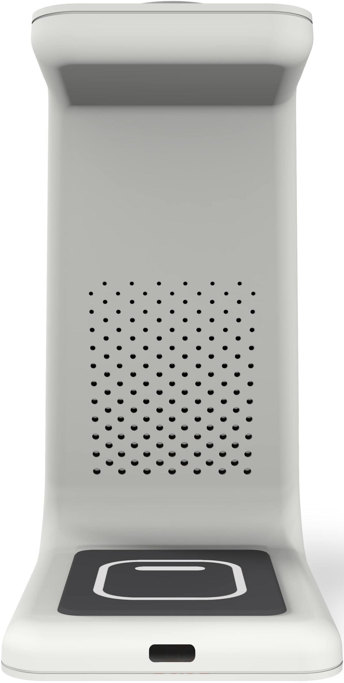 Un appareil rectangulaire blanc avec surface perforée et symbole indicateur de charge.