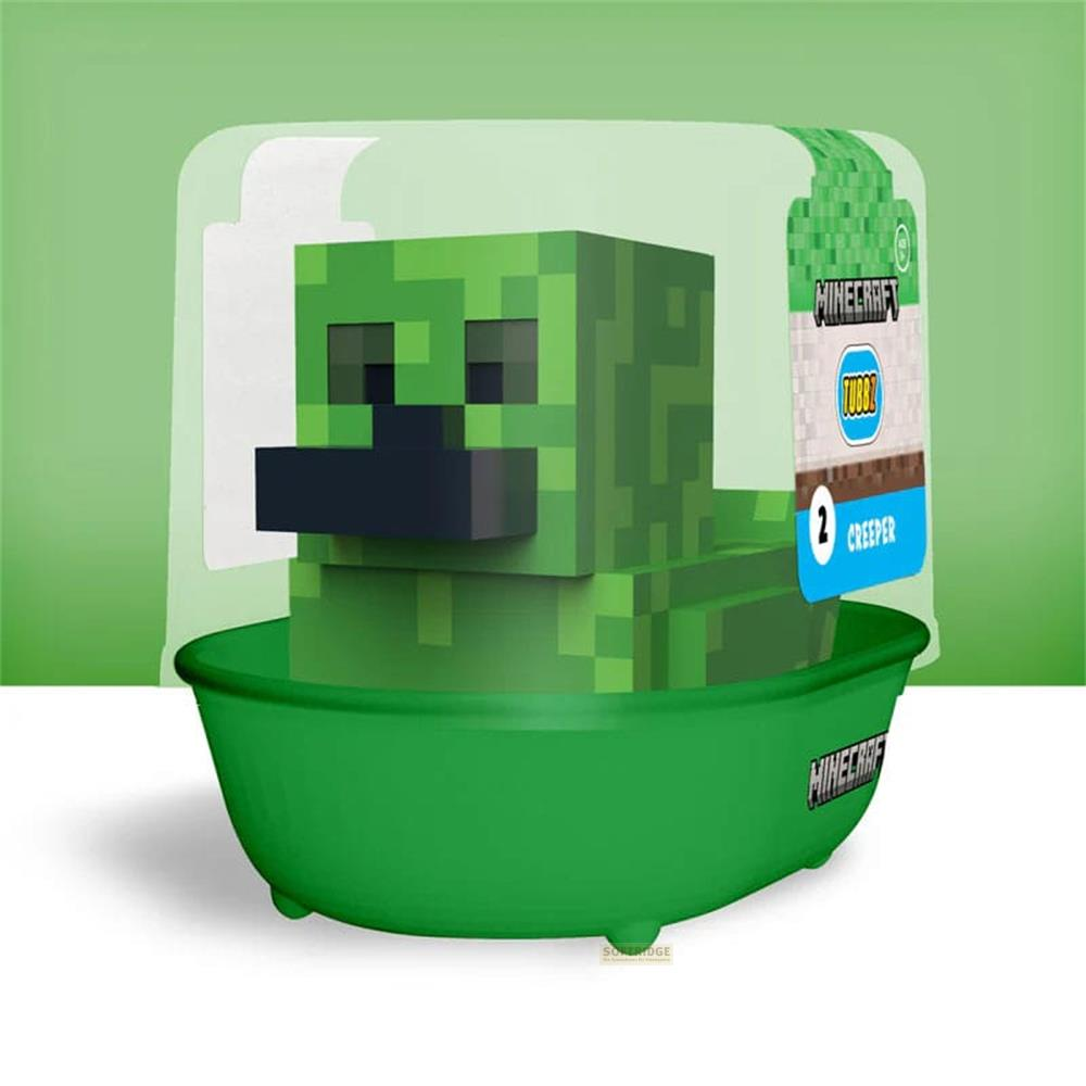 Minecraft Creeper Spielzeug in einer grünen Badewanne in einem durchsichtigen Behälter.