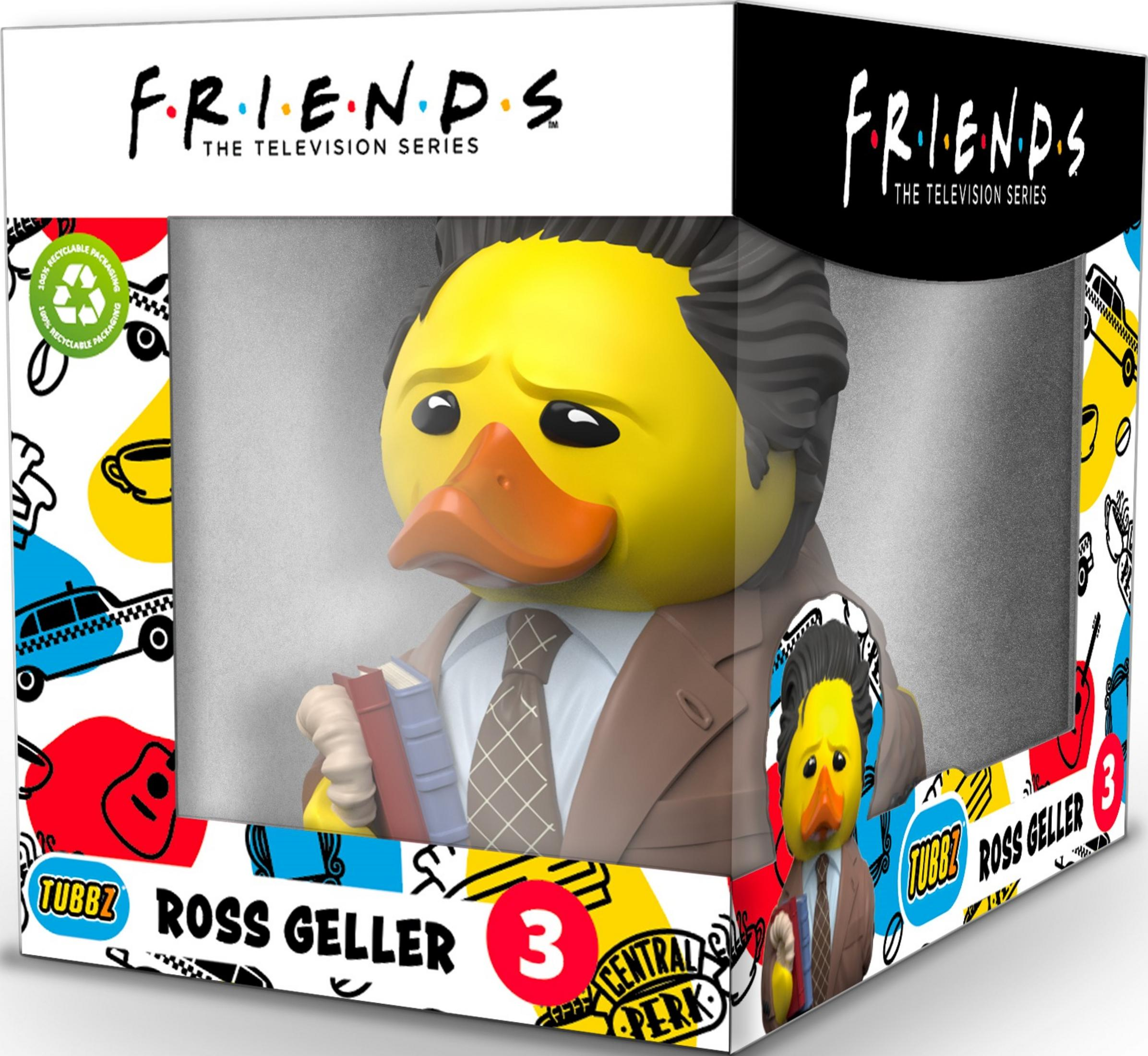 Eine gelbe Gummi-Ente als Ross Geller aus Friends in braunem Anzug.