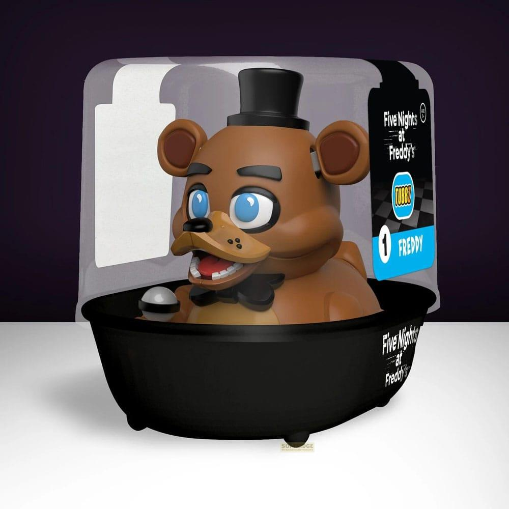 Ein brauner Freddy Fazbear Charakter in schwarzer Verpackung, mit Hut und Fliege.
