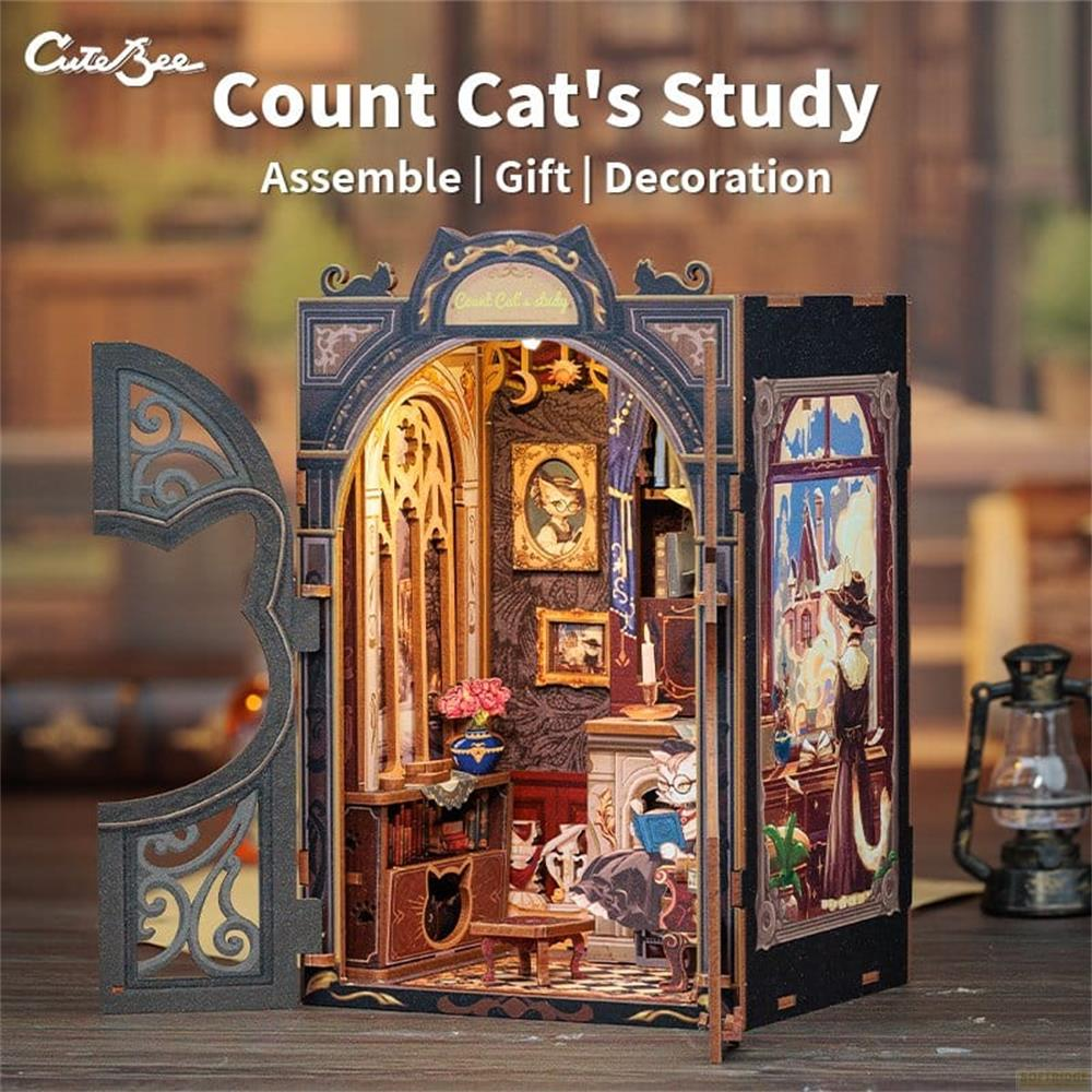 Miniatur-Buchstütze mit einer Katze im viktorianischen Stil, die liest.